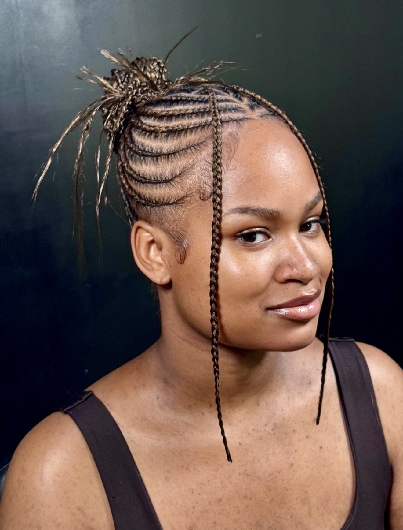 Braided Top Knot With Loose Strands