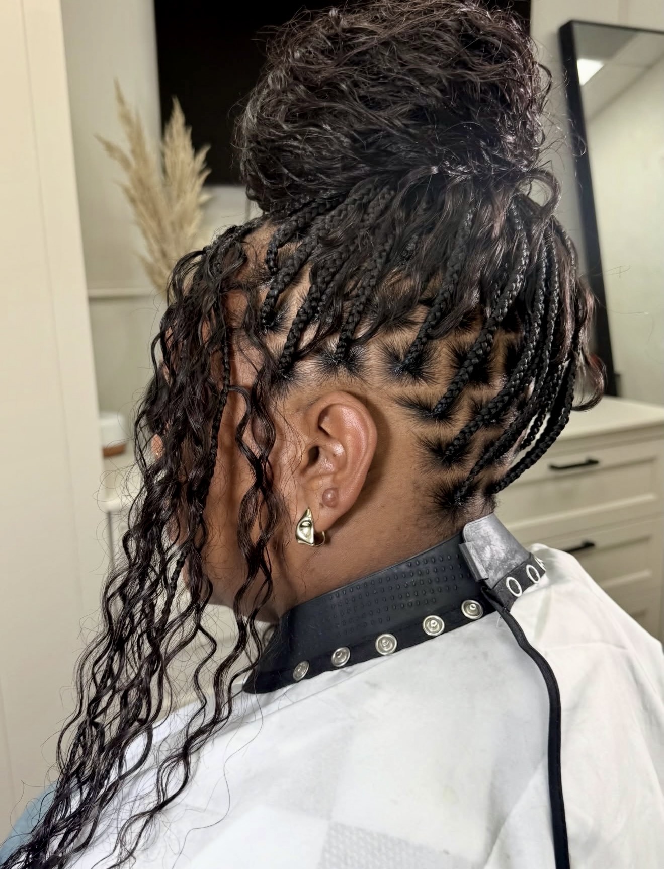 Braided Updo With Loose Curly Tendrils
