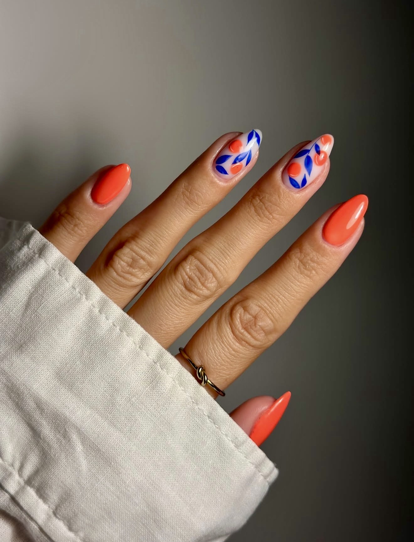 Bright Coral Floral Almond Nails