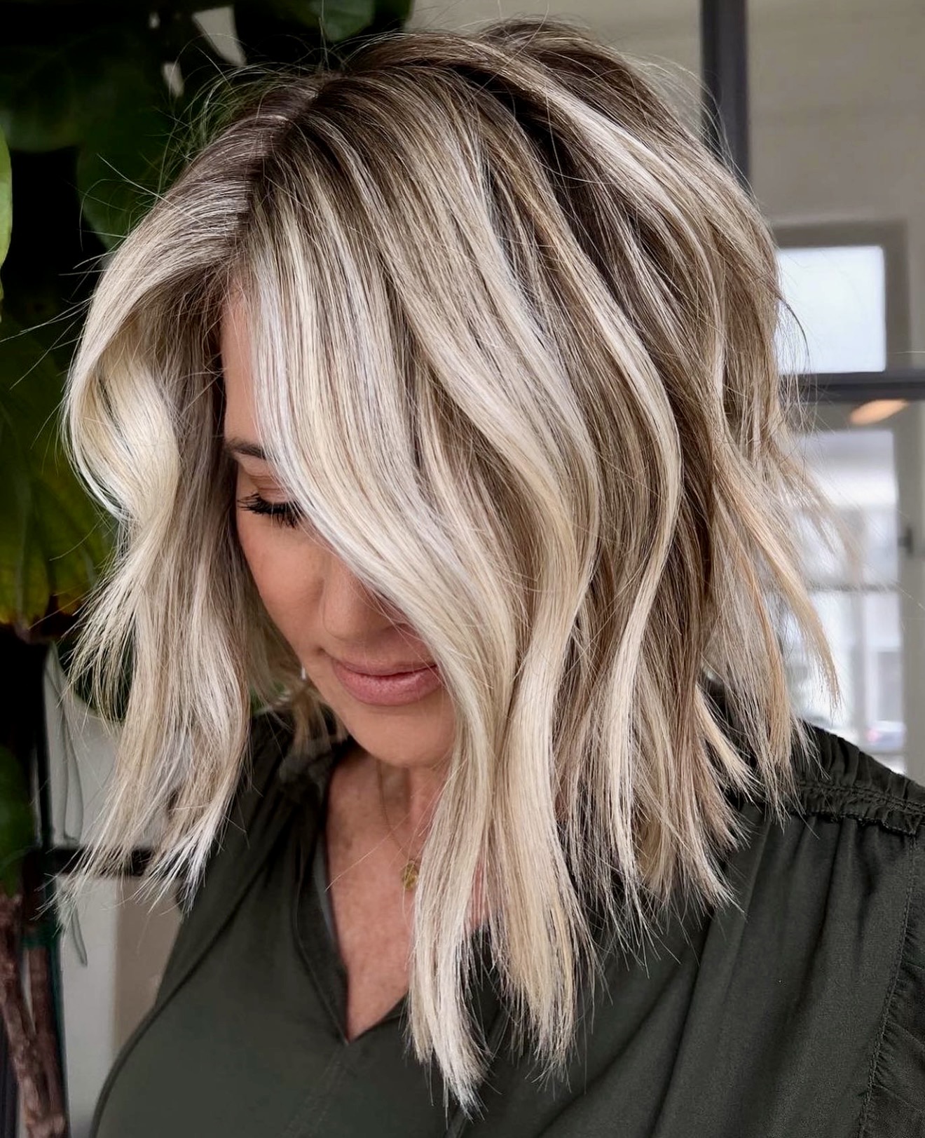 Bronde Babylights With Textured Collarbone Cut