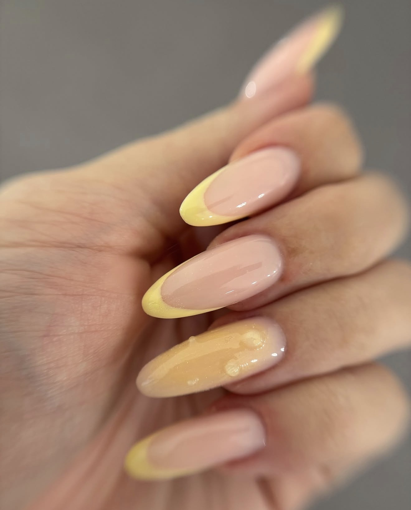 Butter Yellow French Tip Oval Nails