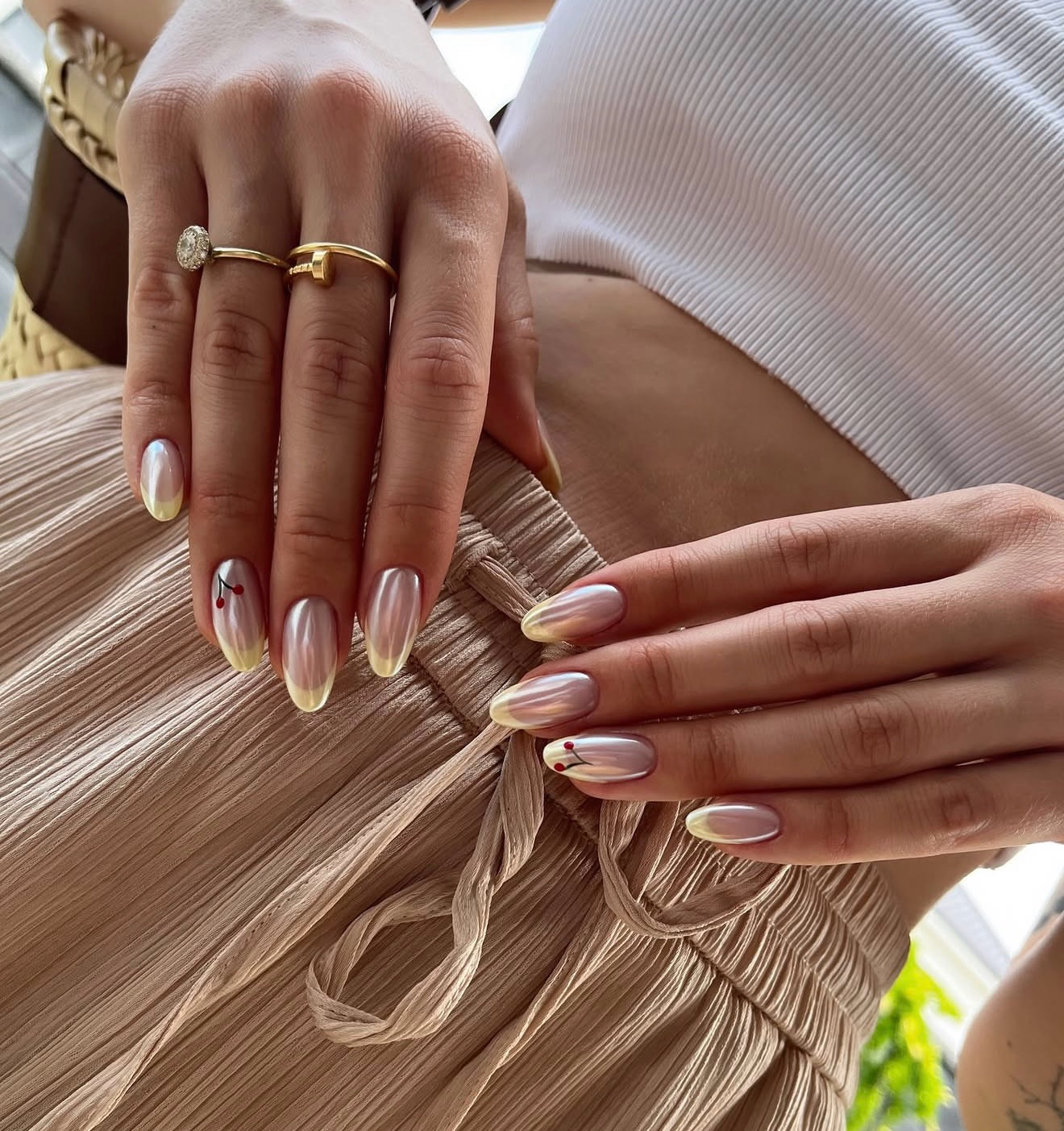 Butter Yellow Pearl Chrome Almond Nails