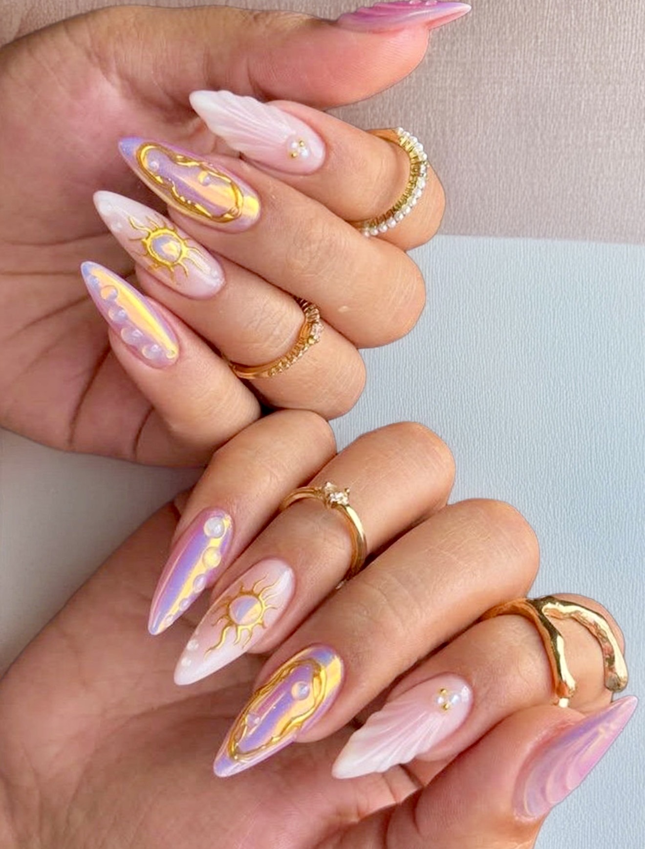 Celestial Sun and Moon Almond Nails
