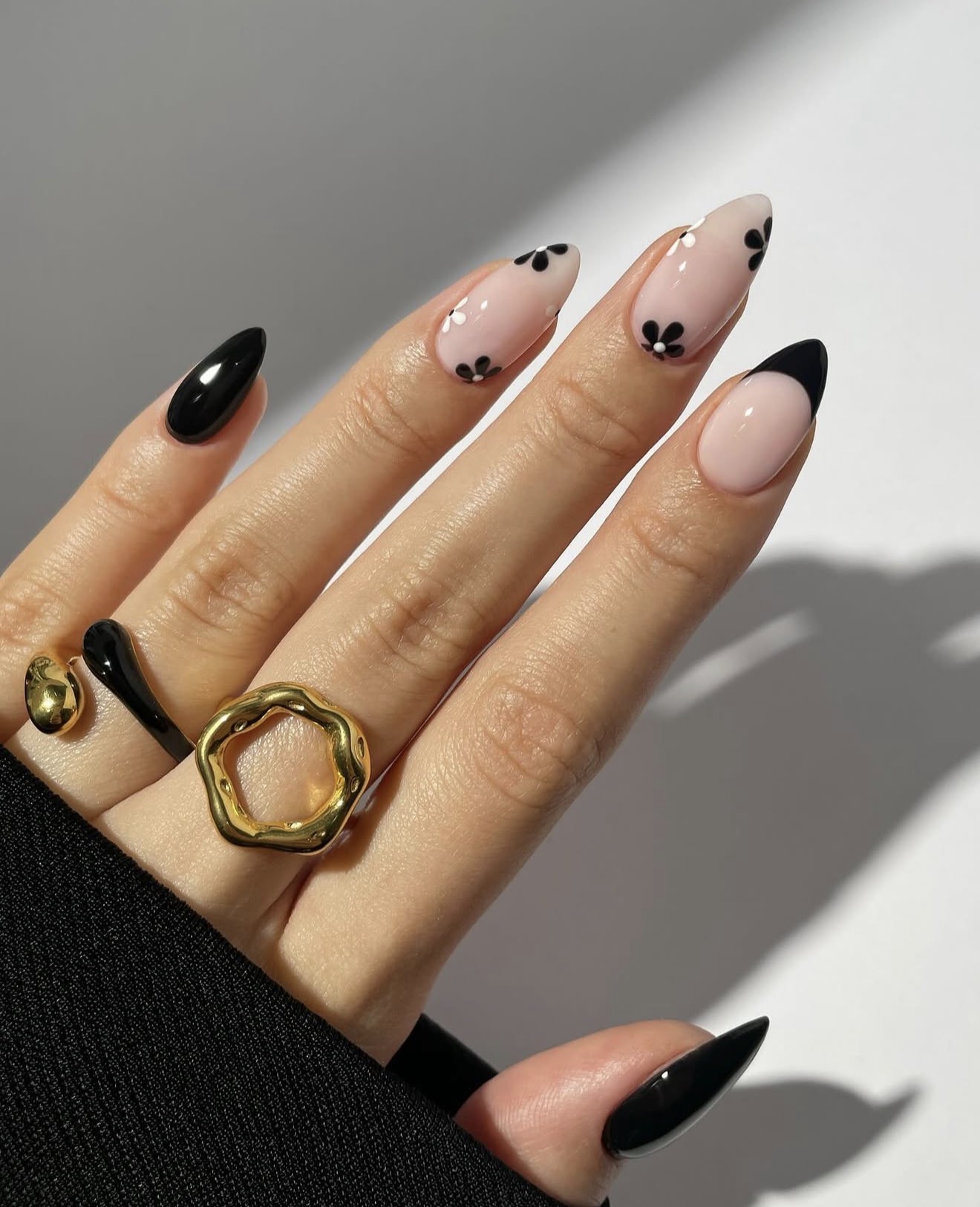 Chic Black Flower French Tip Almond Nails