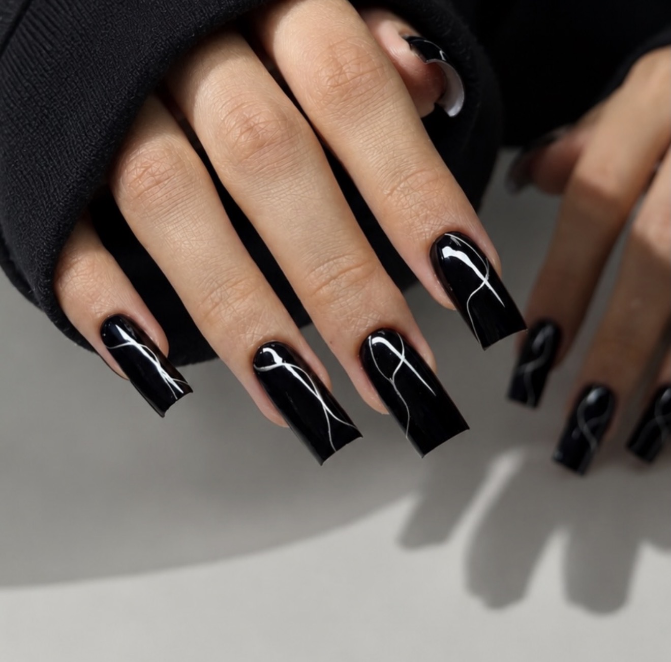 Chic Black & White Swirl Long Square Nails