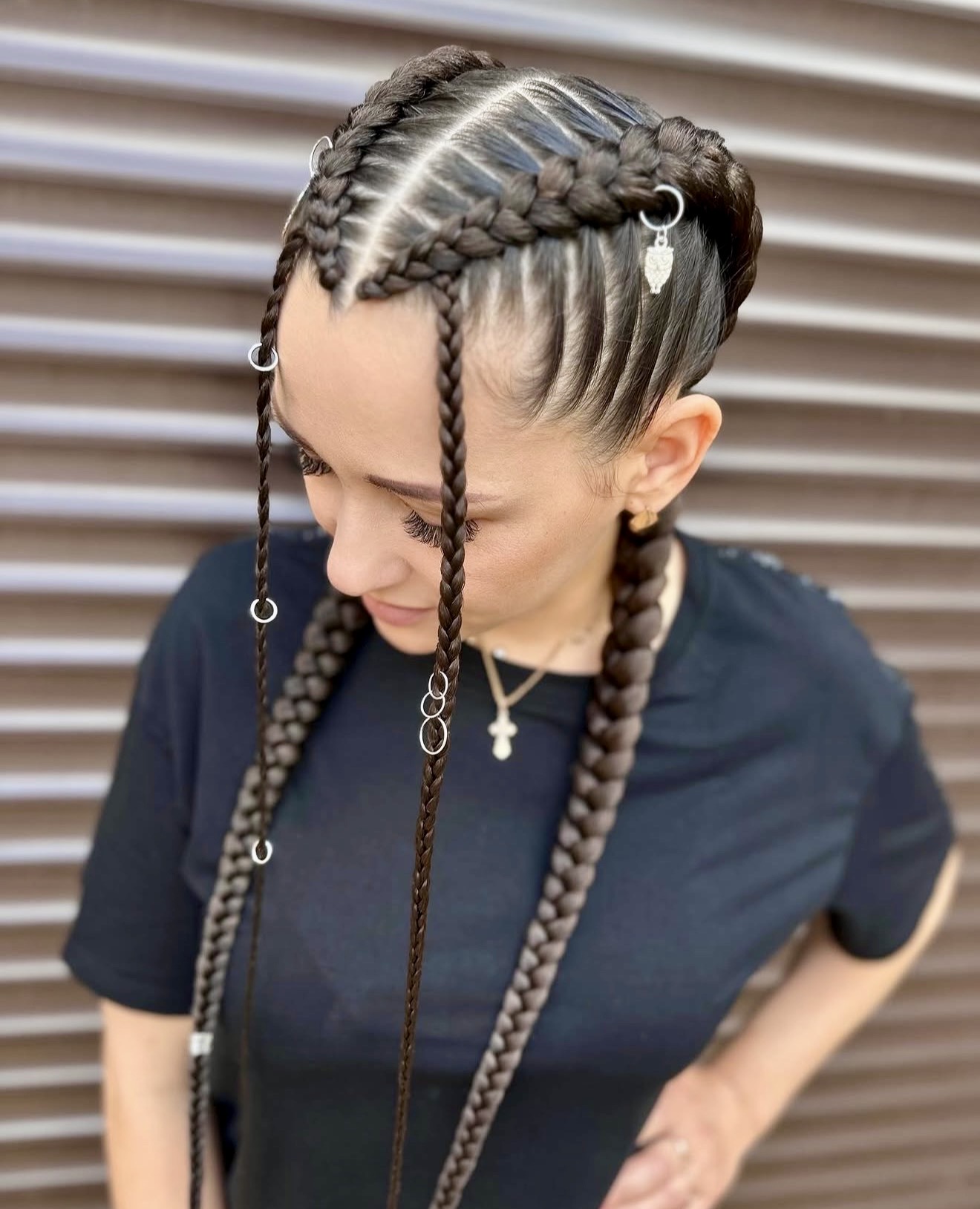 Chic Braided Updo With Statement Rings