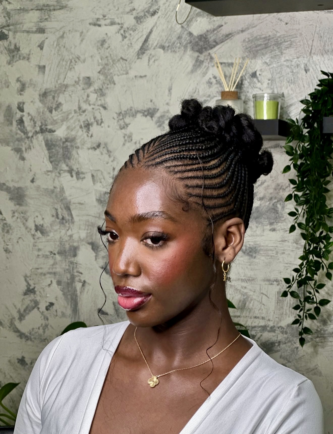Chic Cornrows With Elevated Top Knots