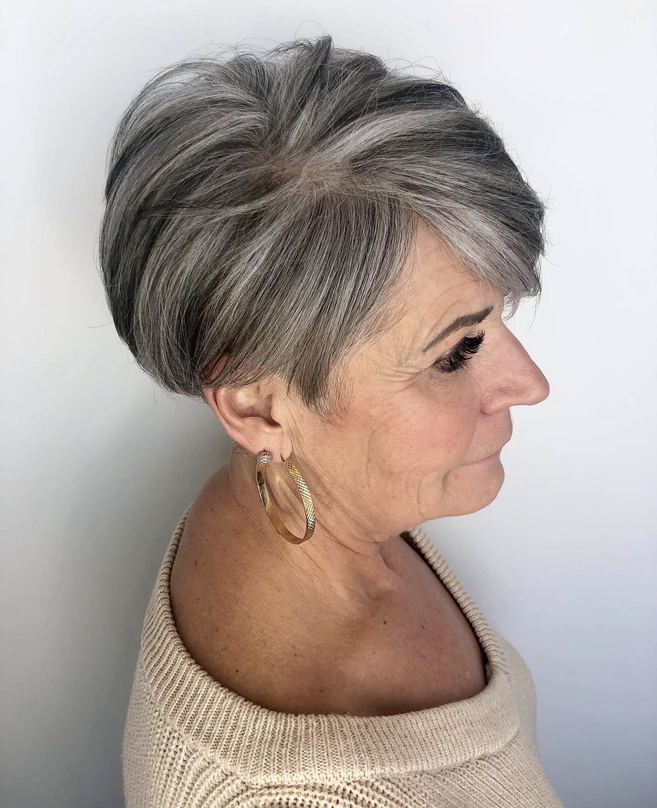 Chic Layered Pixie With Subtle Silver Streaks