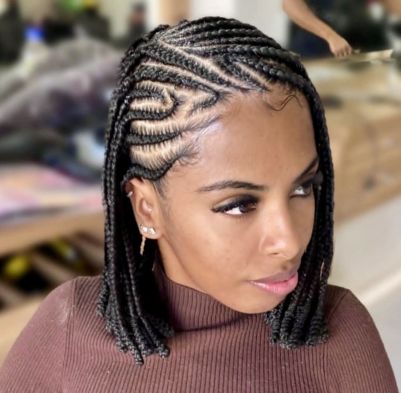 Chic Side-Swept Cornrows With Bob Length Braids