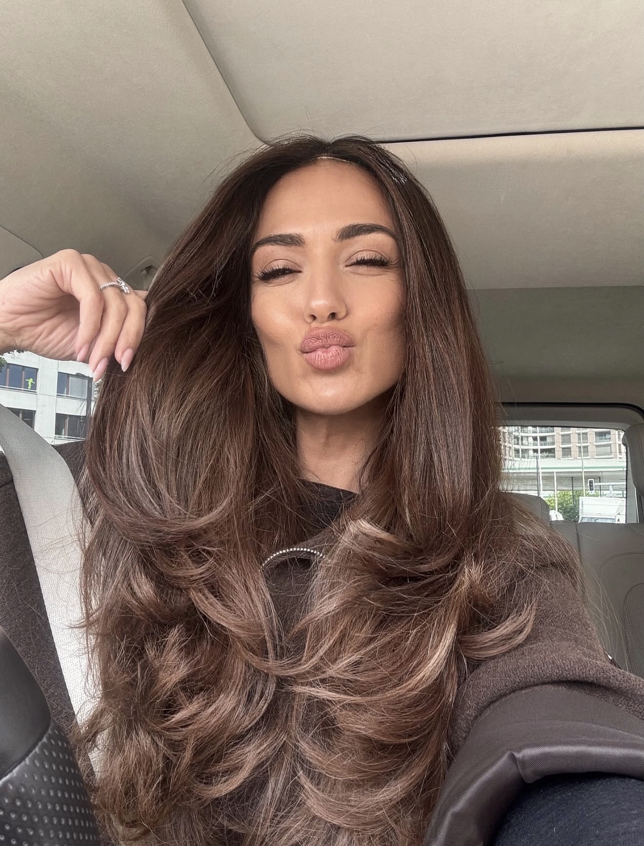 Chocolate Brunette With Honey Highlights and Voluminous Waves