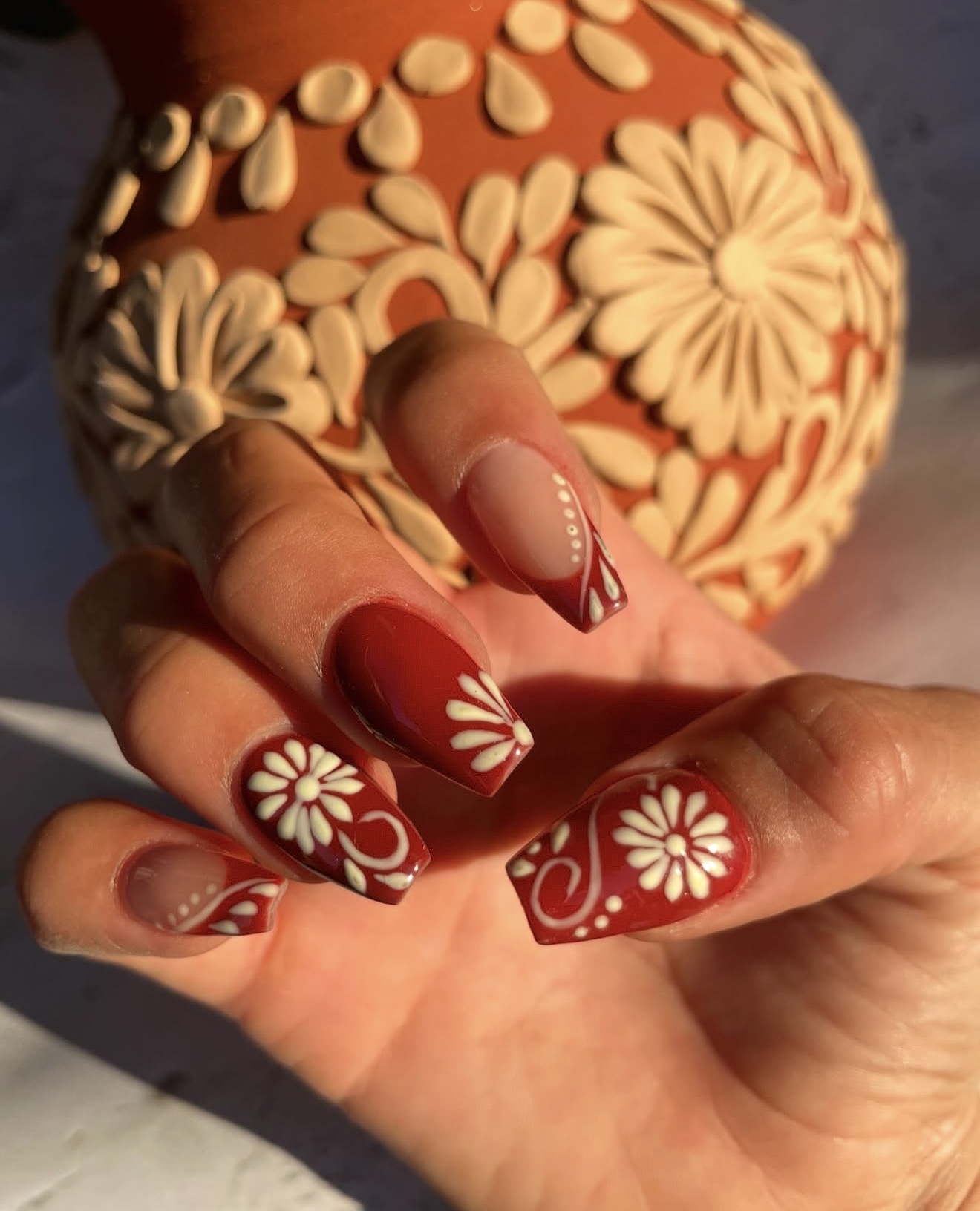 Classic Red Floral Swirl French Tip Nails