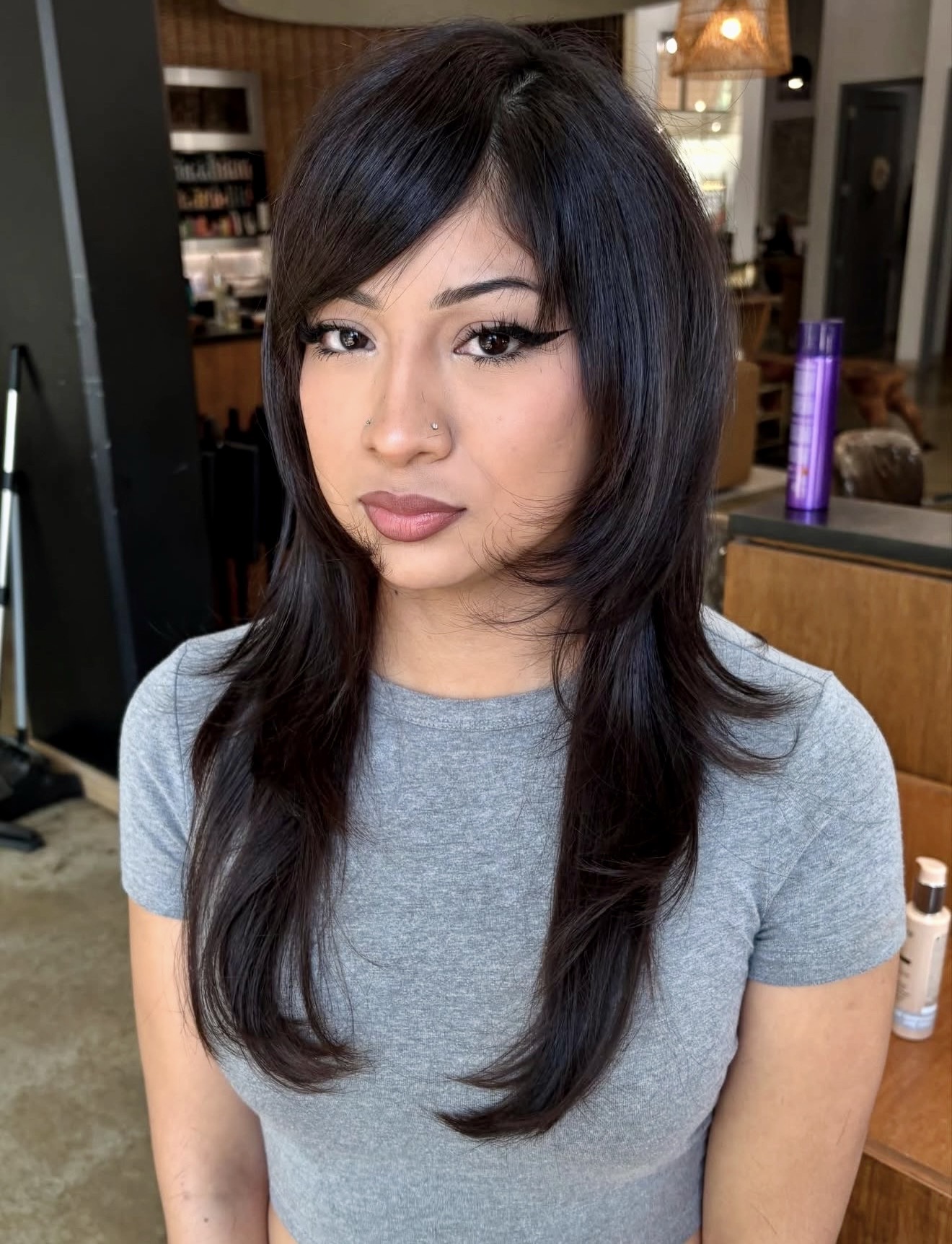 Dark-Hued Wolf Cut With Wispy Bangs