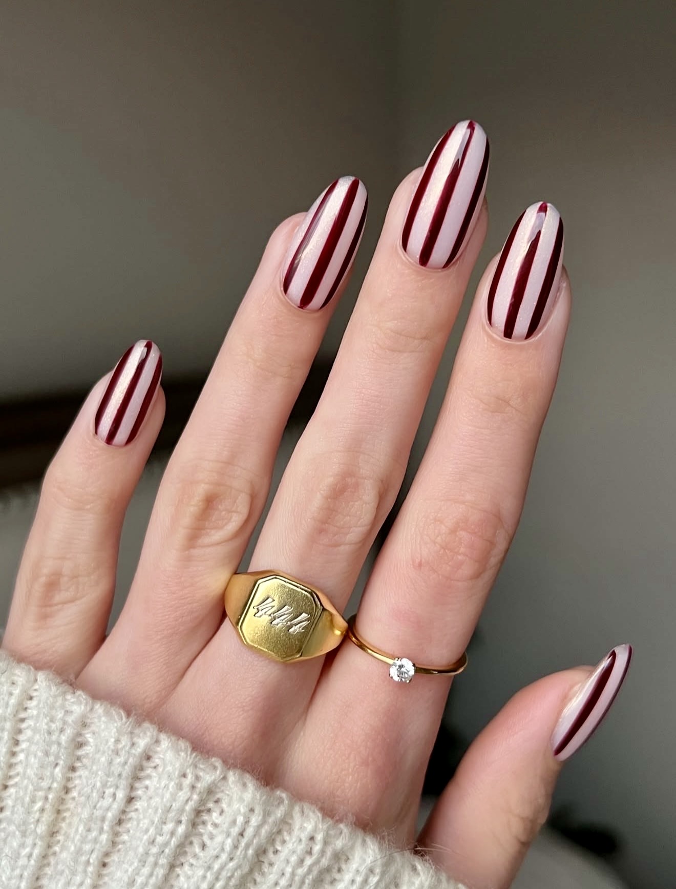 Deep Burgundy & Cream Striped Almond Nails