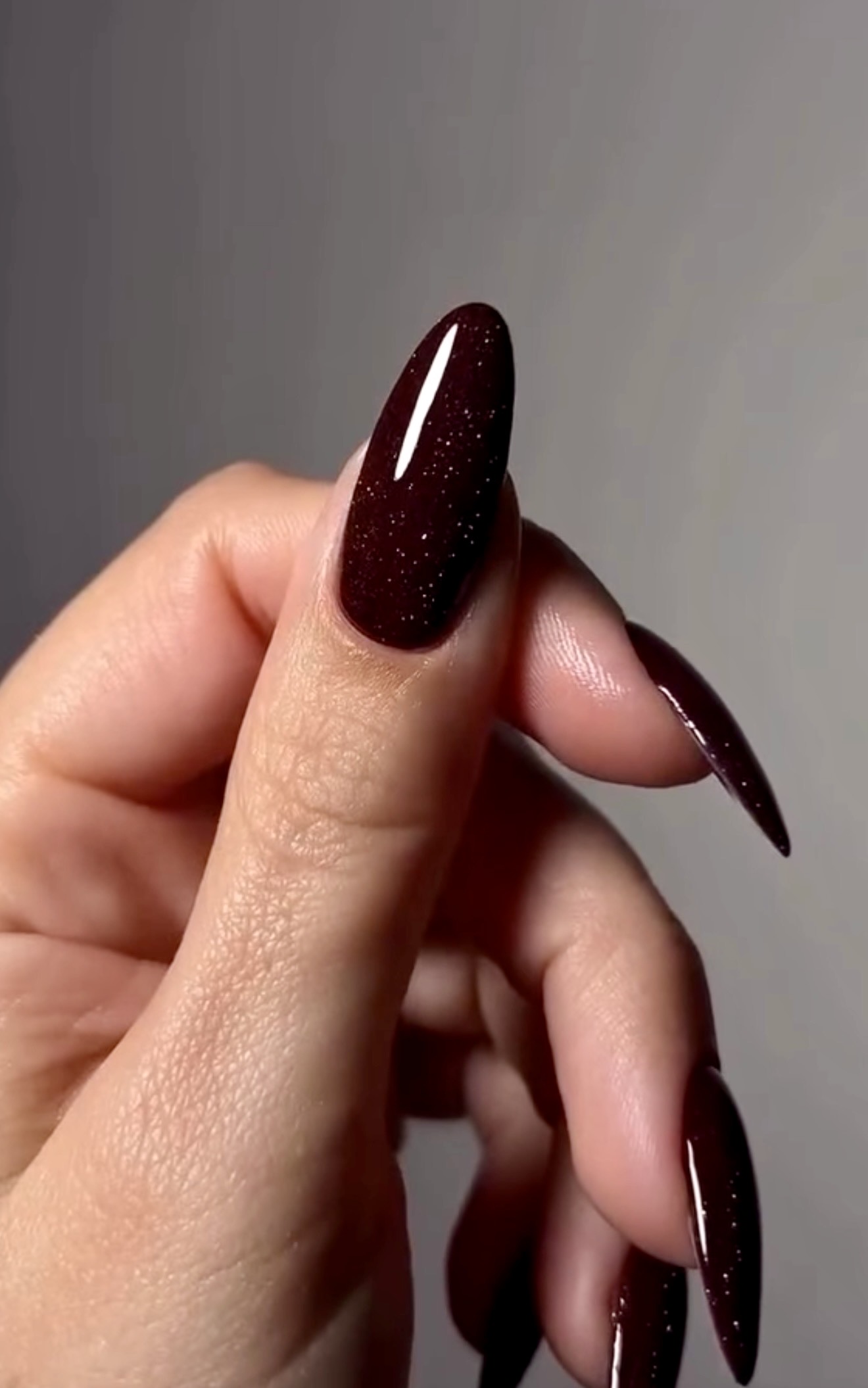 Deep Burgundy Glitter Stiletto Nails