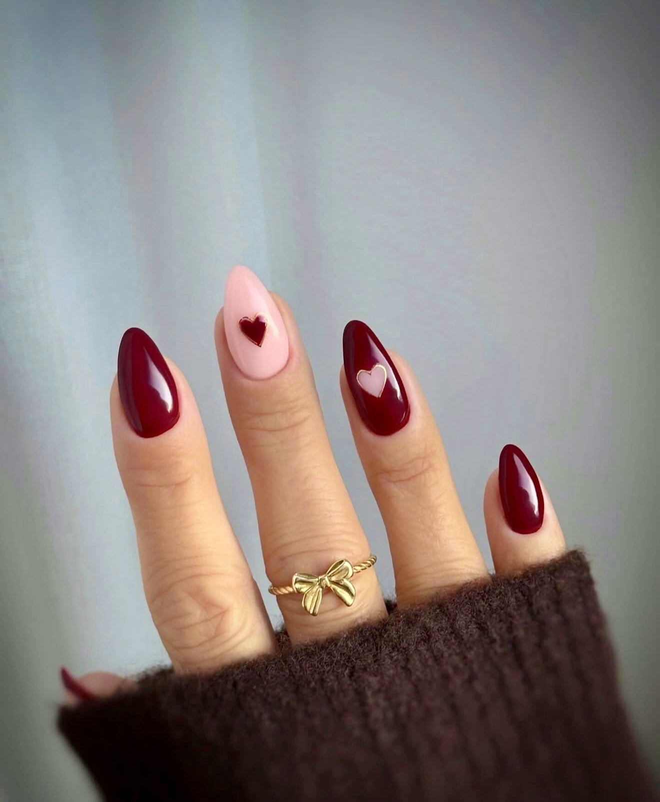 Deep Burgundy & Pink Heart Almond Nails