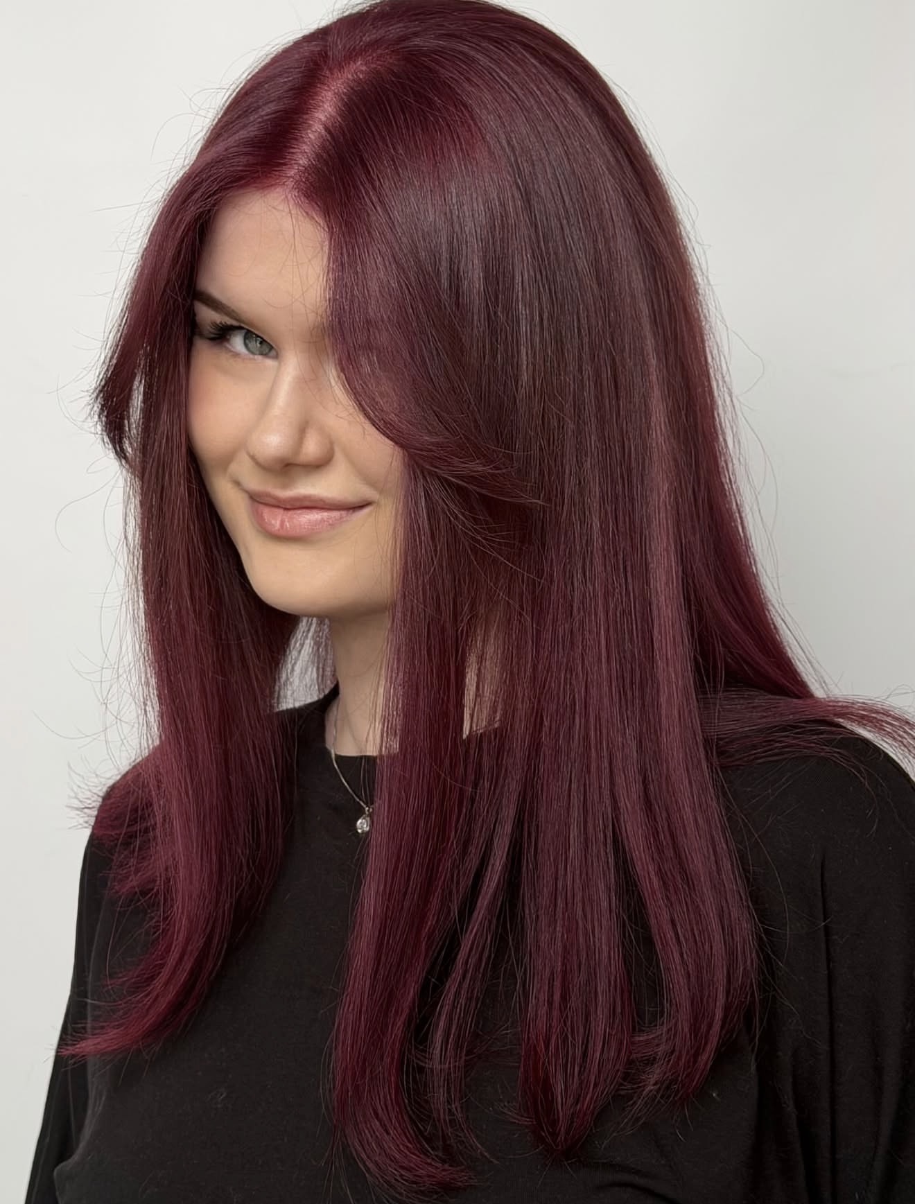 Deep Cherry Cola Hair With Face-Framing Layers