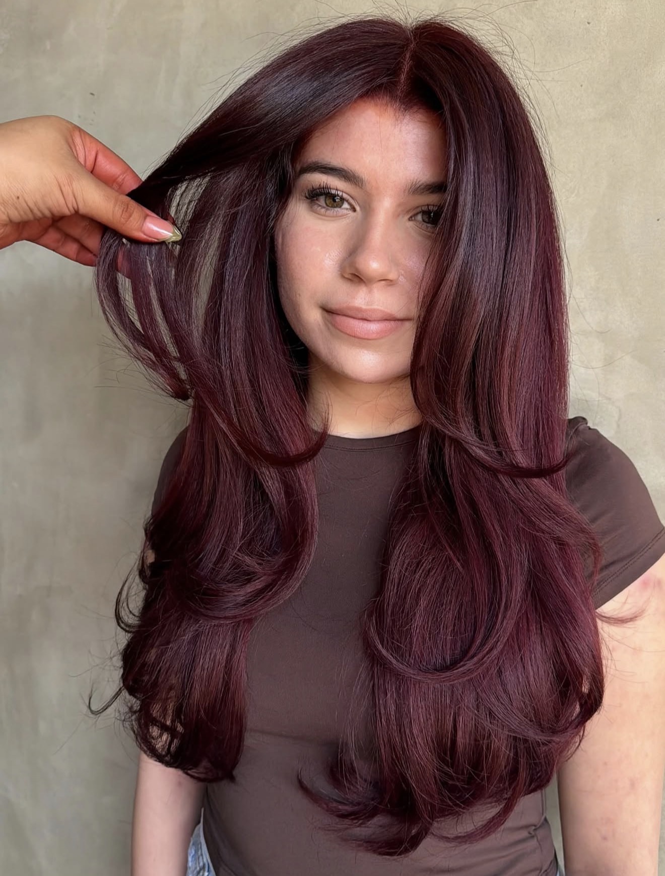 Deep Cherry Cola Hair With Voluminous Waves