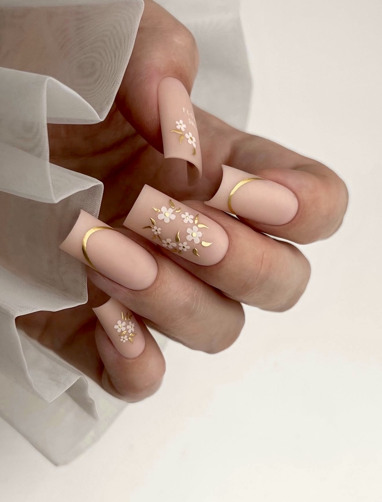 Delicate Floral Nude Matte Long Coffin Nails