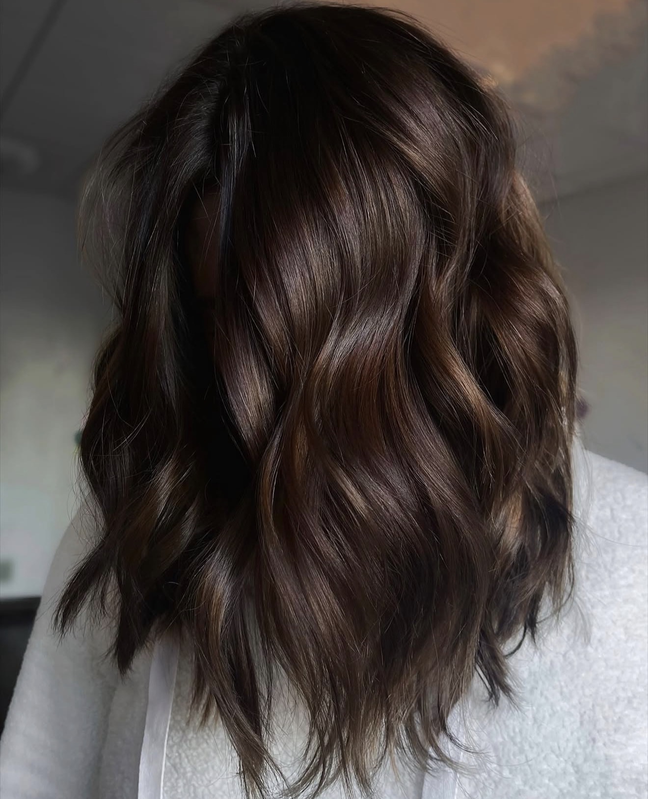 Dimensional Chocolate Brown Wavy Mid-Length Hair