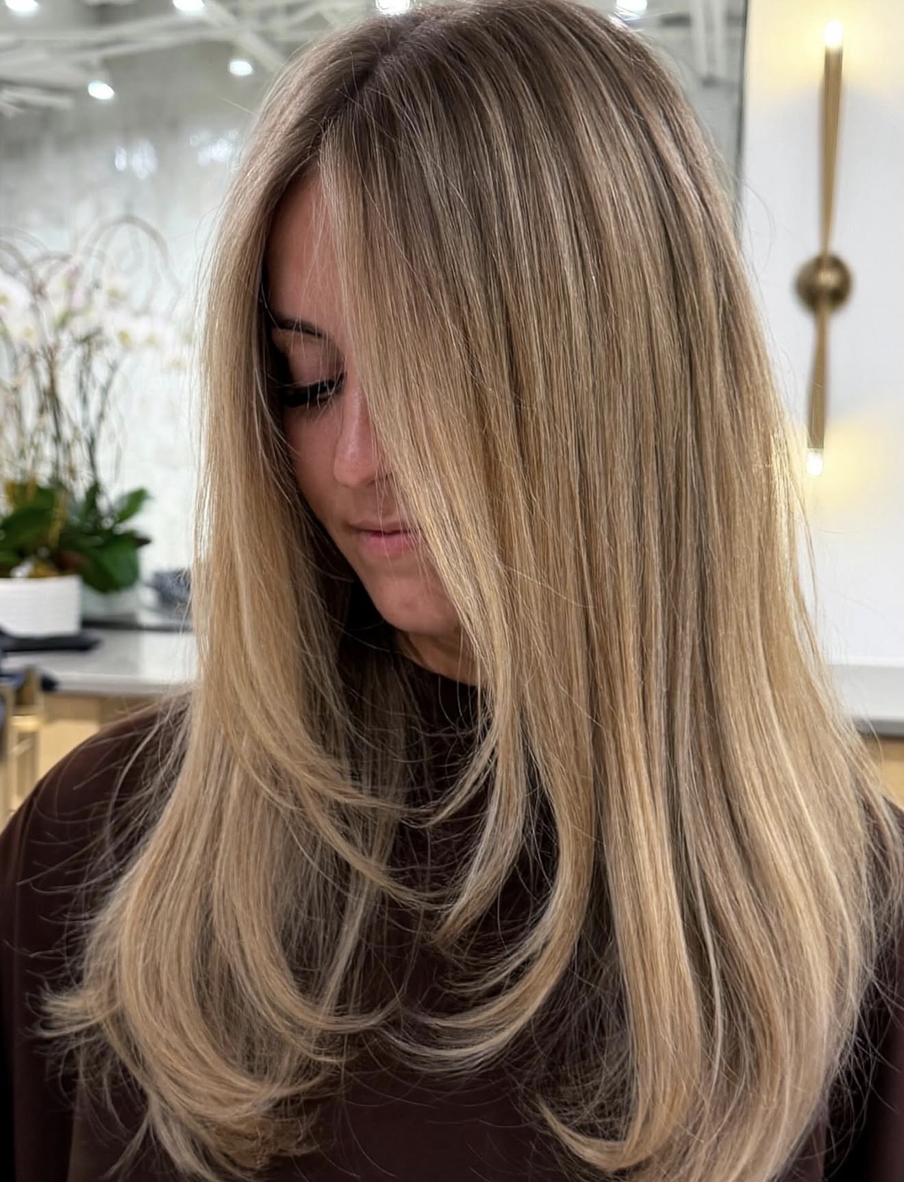Dimensional Dirty Blonde With Face Framing Layers