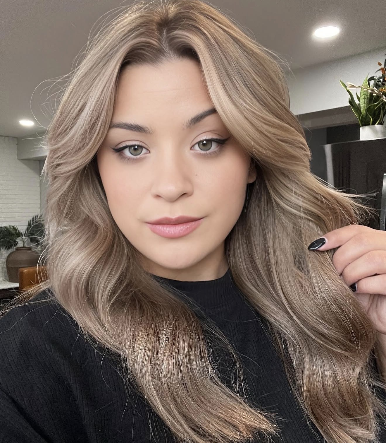 Dimensional Dirty Blonde With Soft Face-Framing Waves