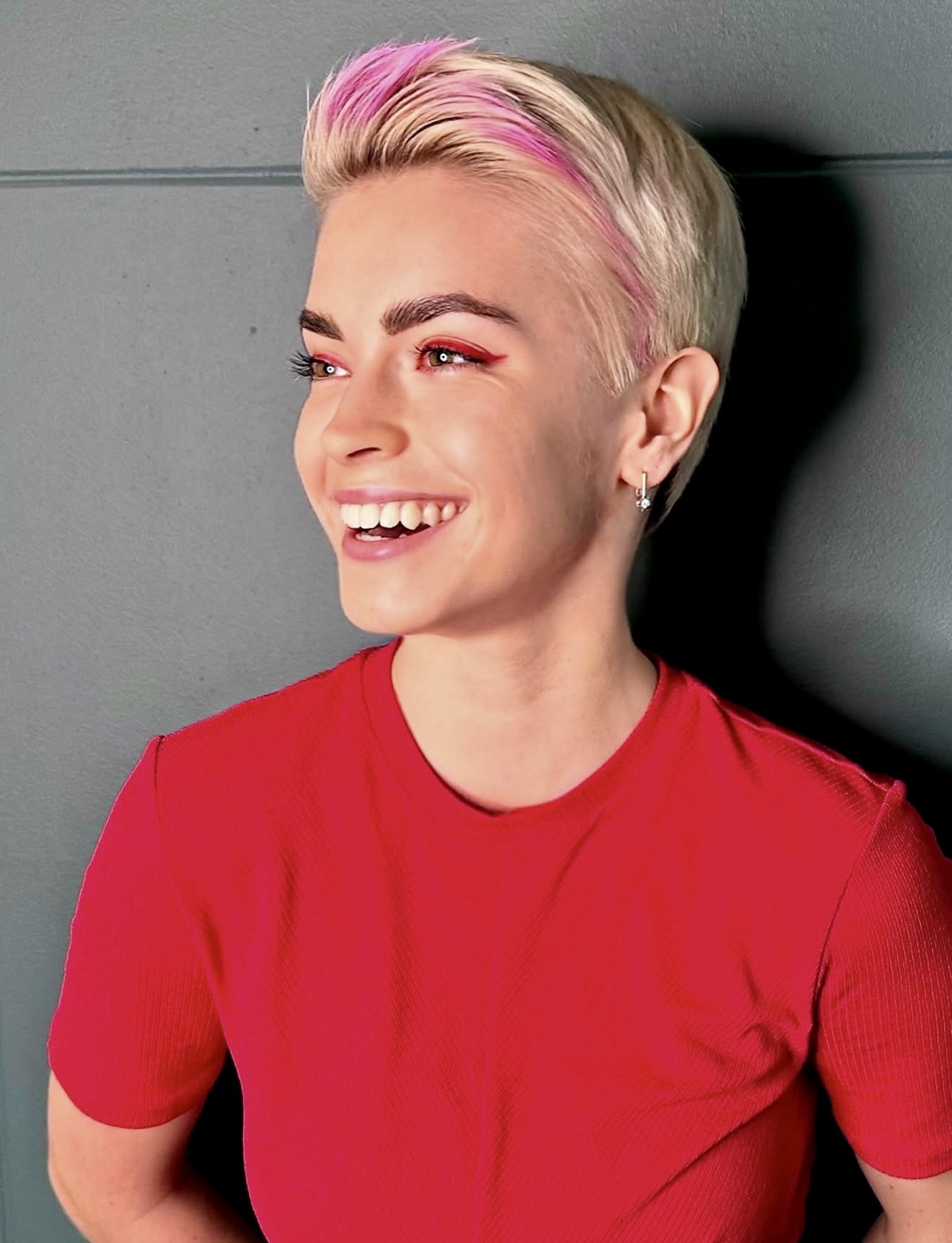 Edgy Pink Streaked Textured Pixie Cut
