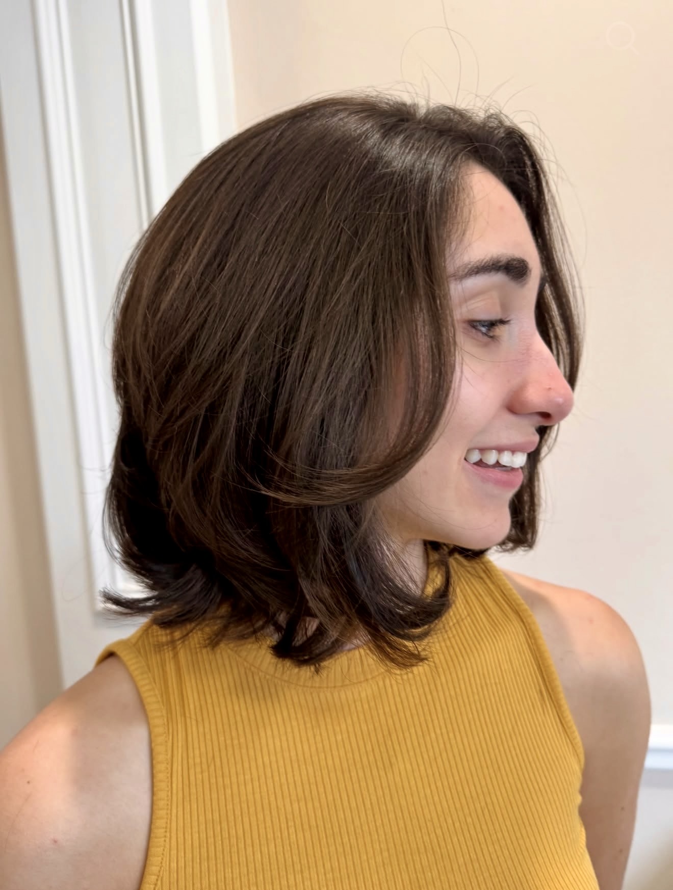Effortless Layered Dark Brown Bob With Face Framing