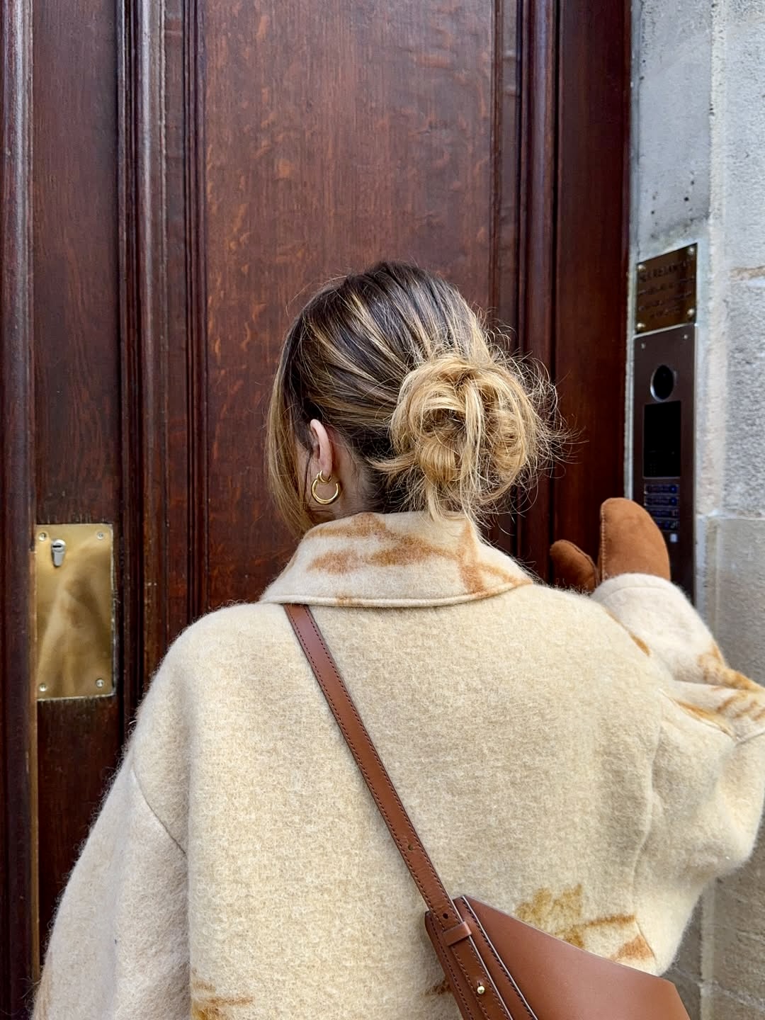 Effortless Messy Bun With Honey Blonde Balayage
