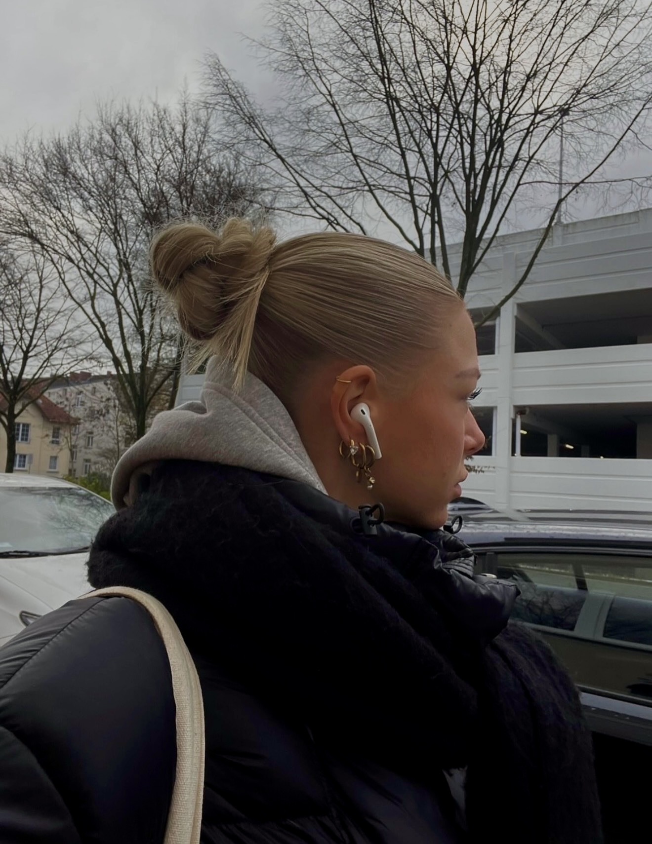 Effortless Messy Top Knot With Honey Blonde Hair