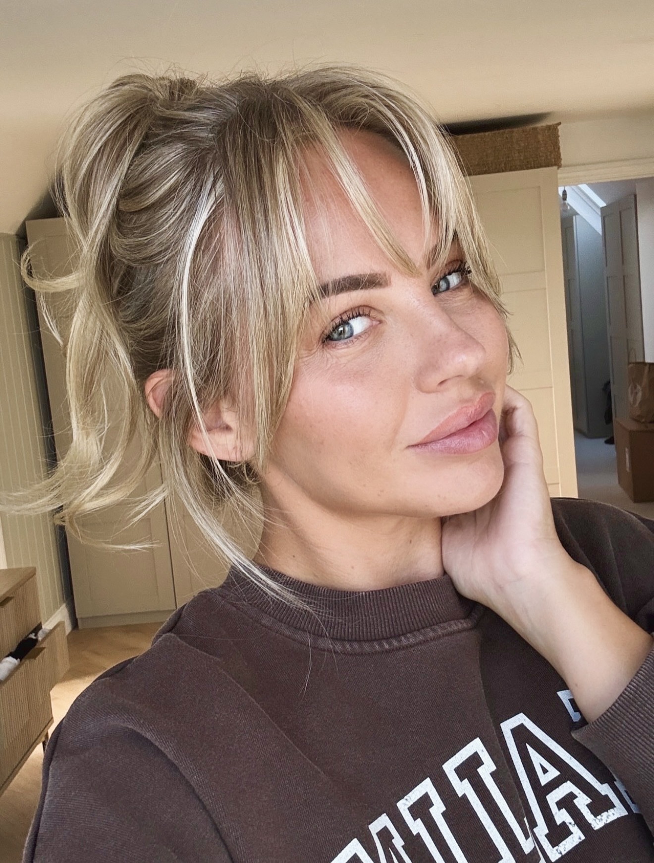 Effortless Textured Ponytail With Wispy Bangs