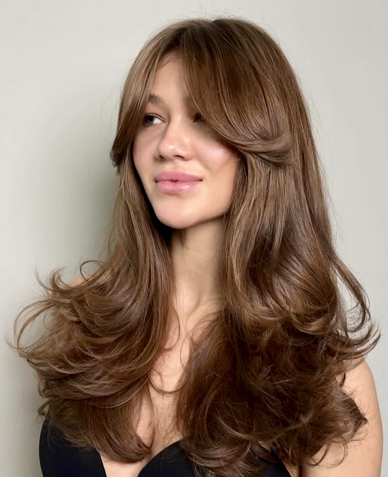 Effortless Voluminous Layers With Curtain Bangs