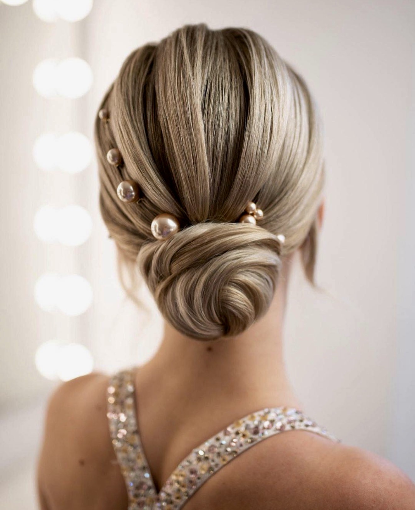 Elegant Low Bun with Pearl Hair Pins