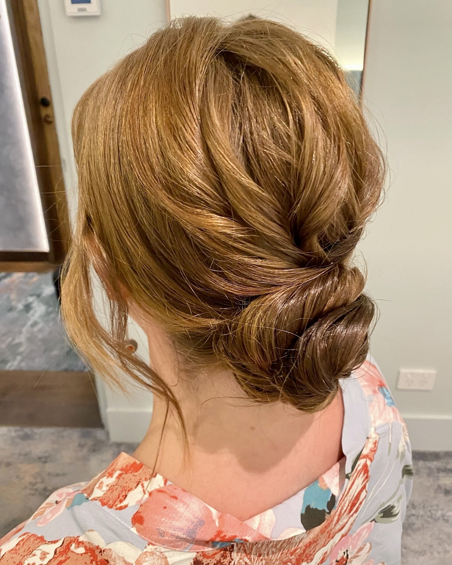 Elegant Twisted Low Chignon With Soft Face-Framing Pieces