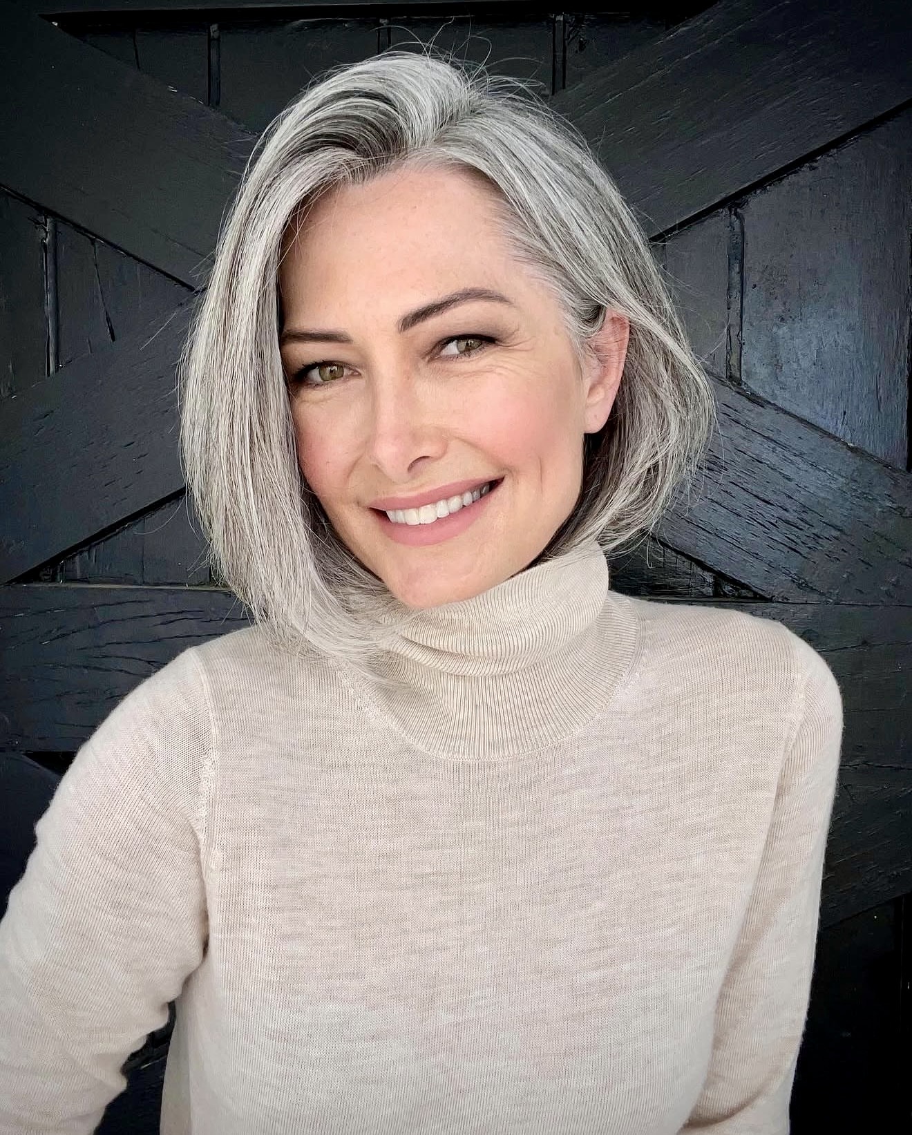 Embracing Silver: Chic Layered Bob with Subtle Waves