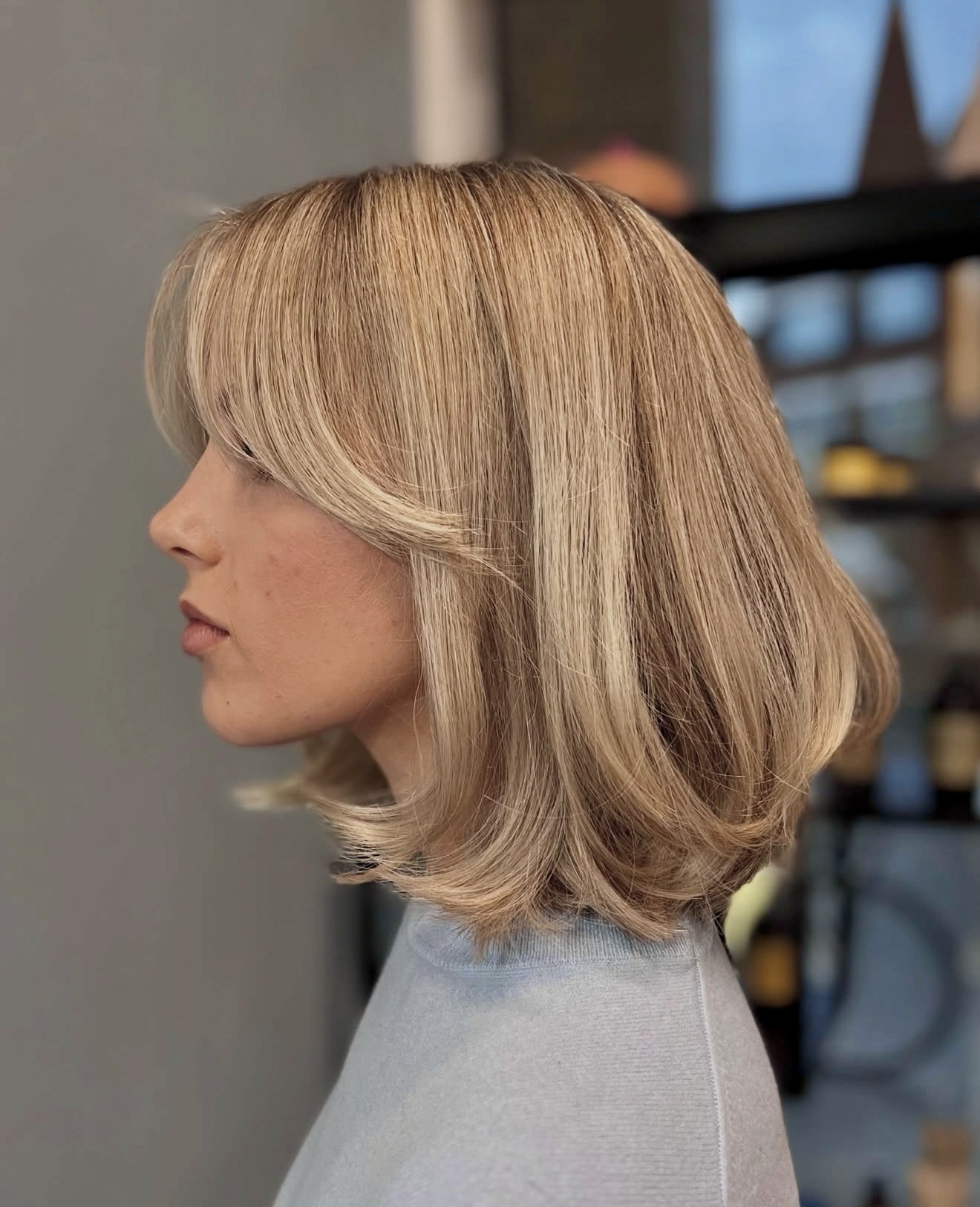 Face-Framing Layers With Tousled Ends Blonde Bob