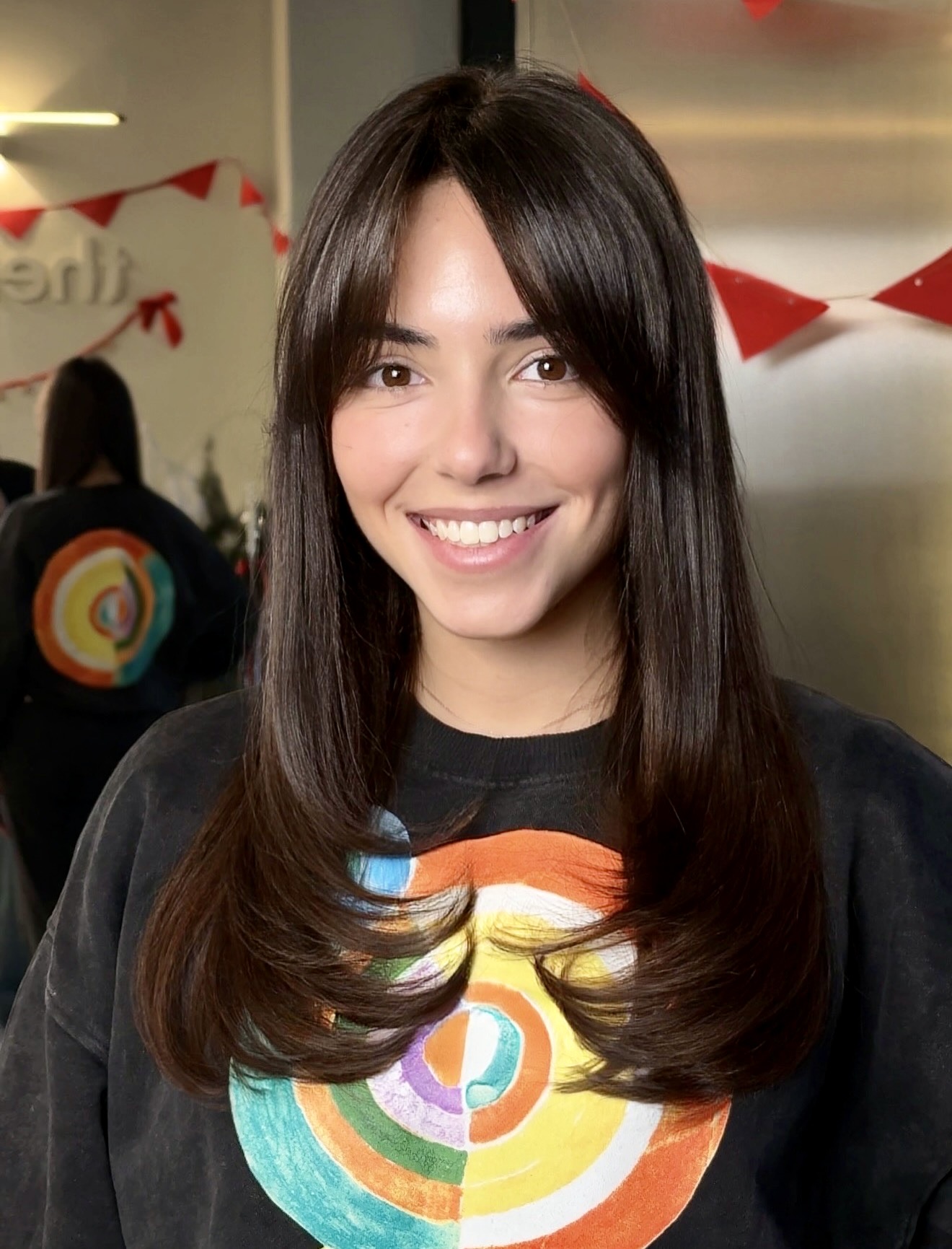 Face-Framing Layers With Wispy Dark Brown Bangs