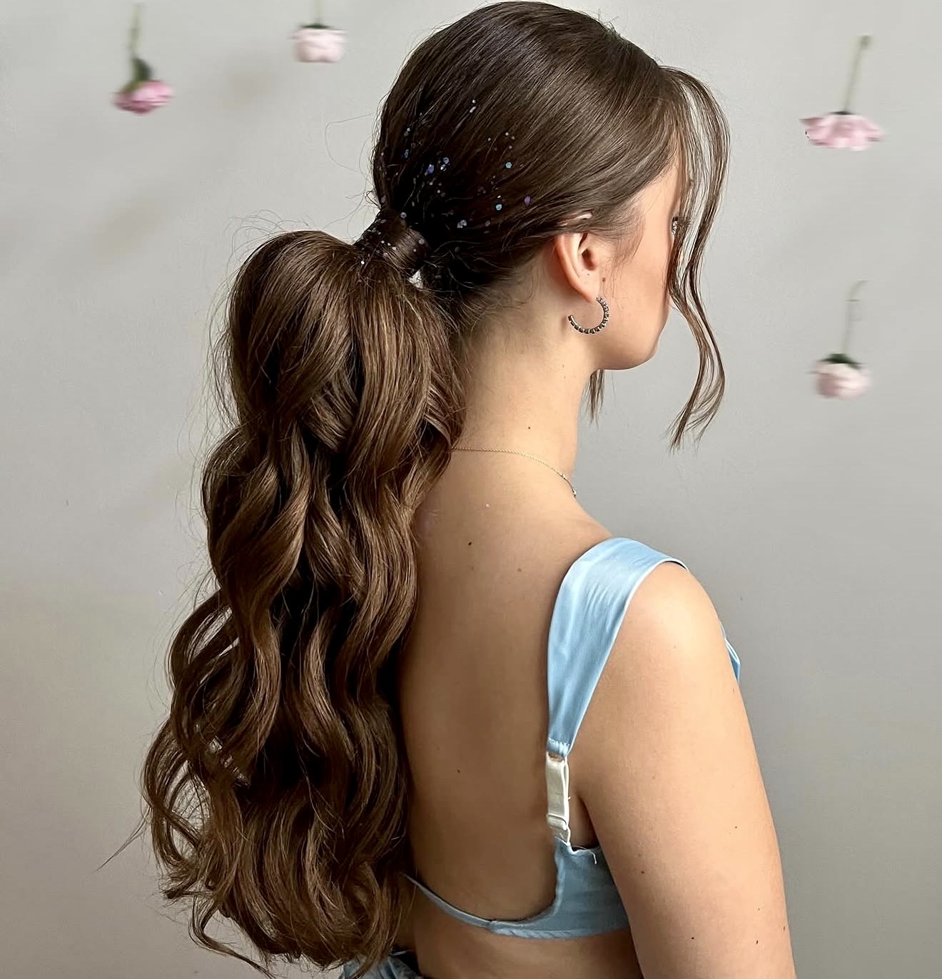 Glamorous High Ponytail With Voluminous Curls