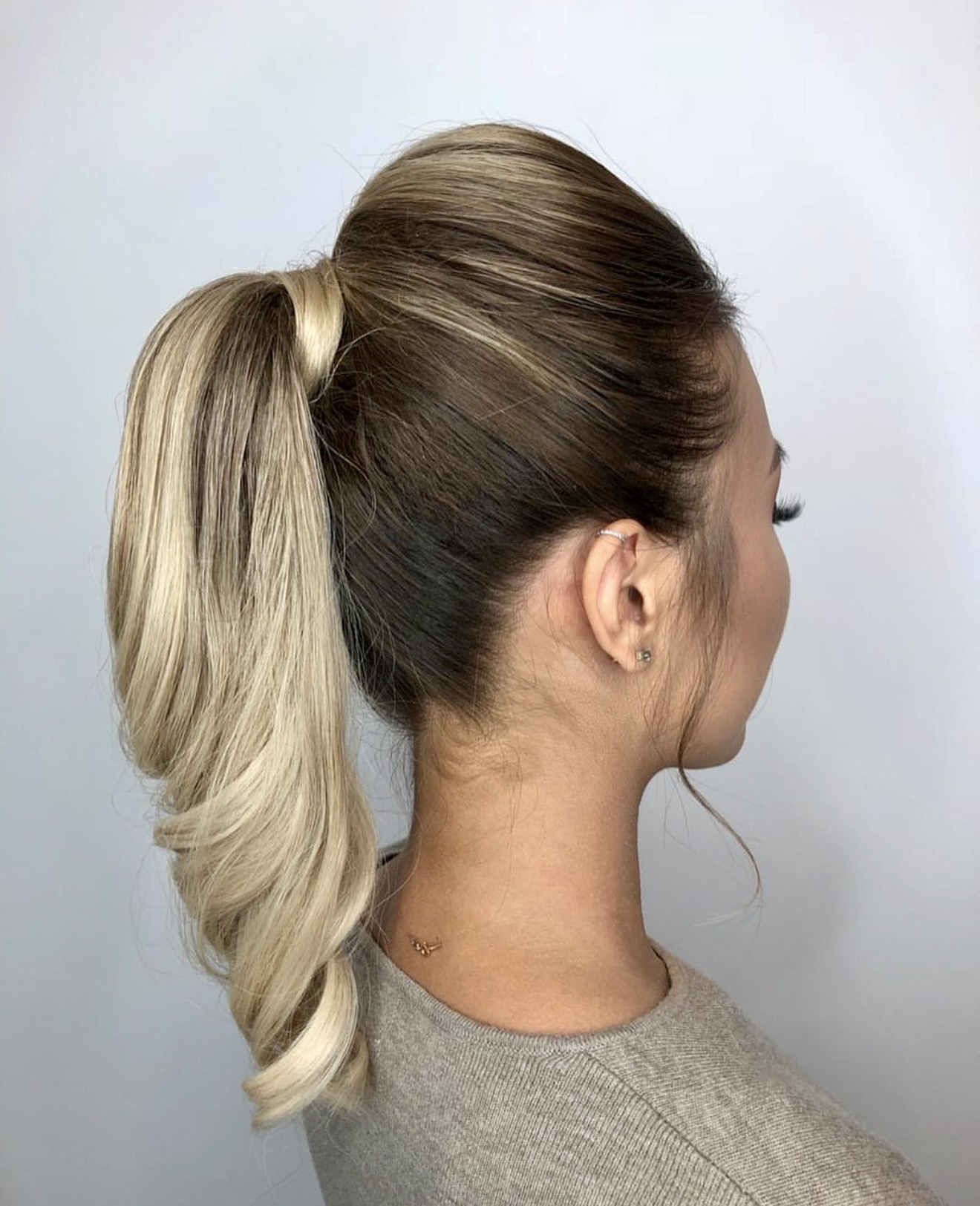 Glamorous High Ponytail With Voluminous Waves