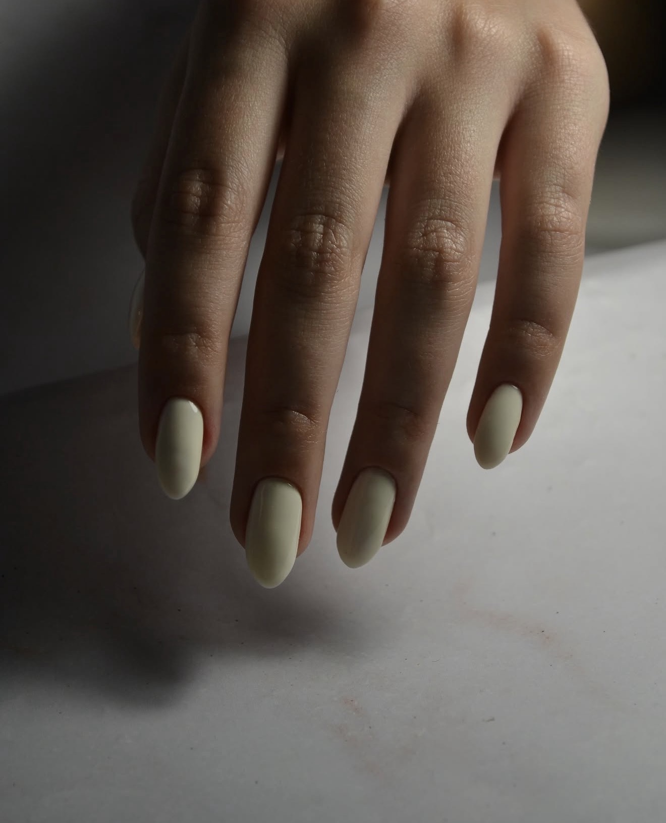 Glossy Butter Yellow Almond Nails