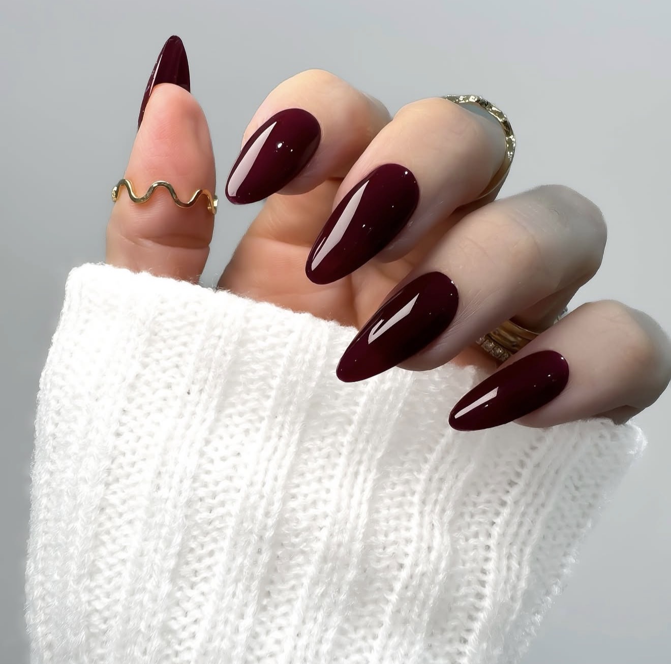 Glossy Deep Cherry Almond Nails