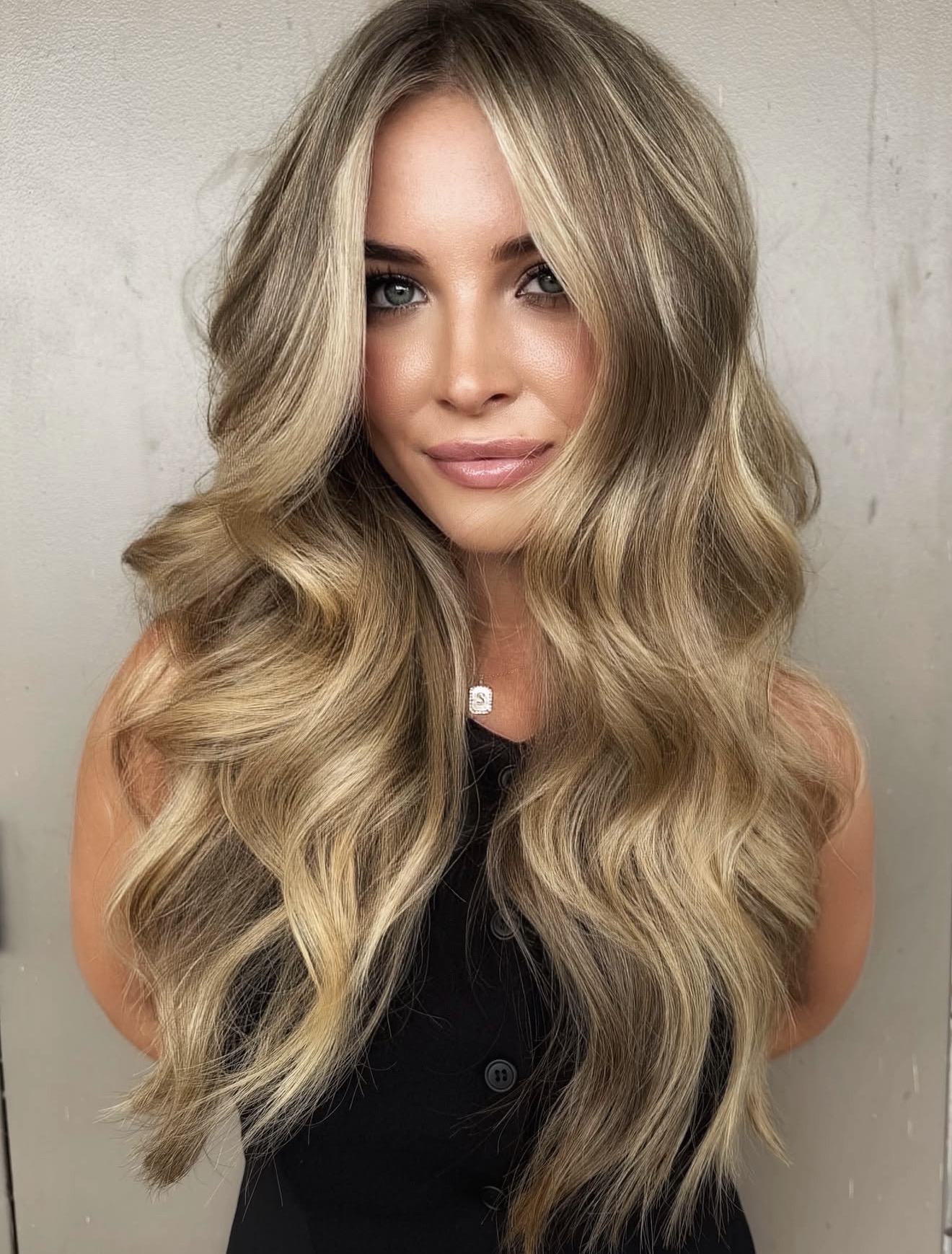 Golden Hour Blonde Balayage With Beachy Waves