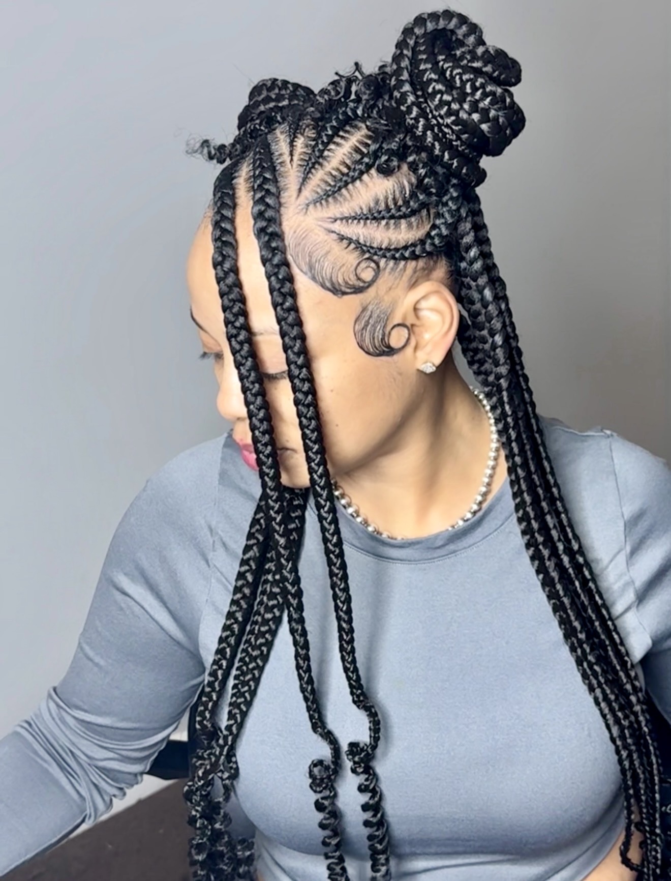 Half-Up Braided Buns With Laid Edges
