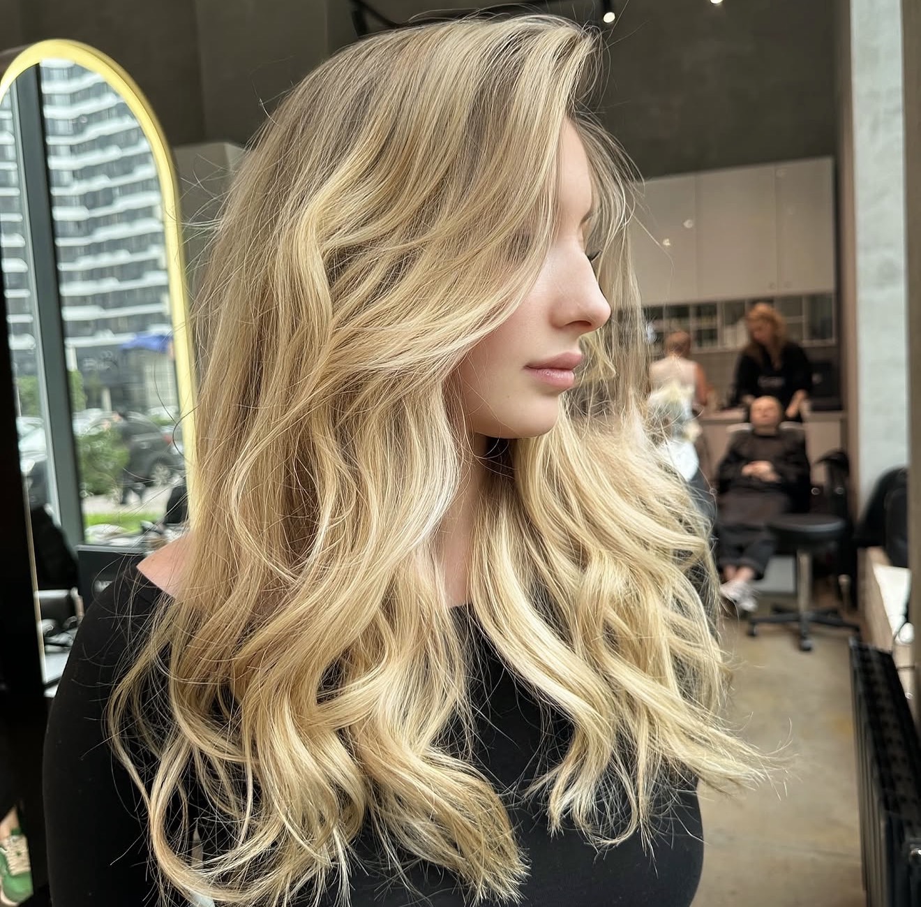 Honey Blonde Balayage With Face-Framing Layers