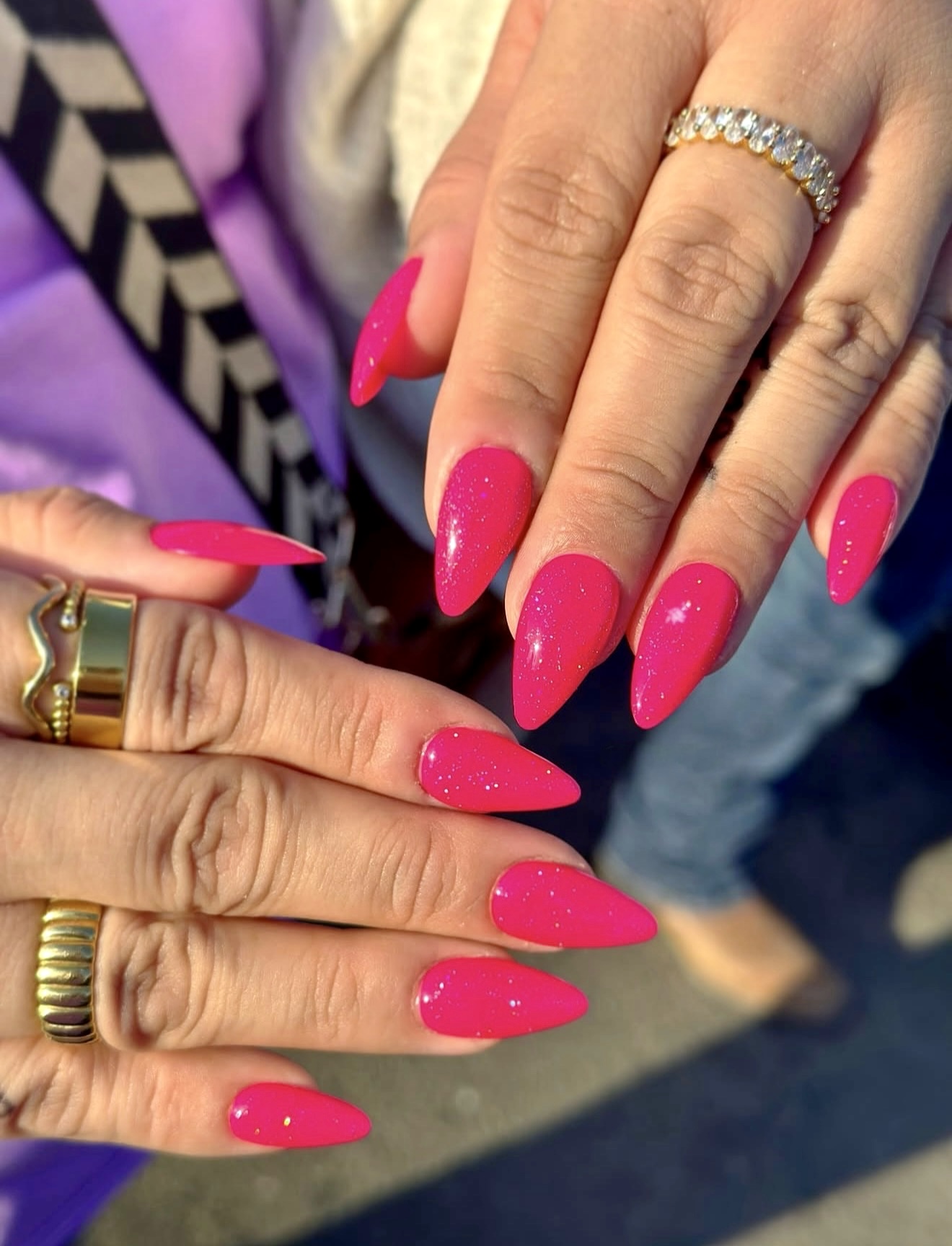 Hot Pink Stiletto Nails with Subtle Glitter
