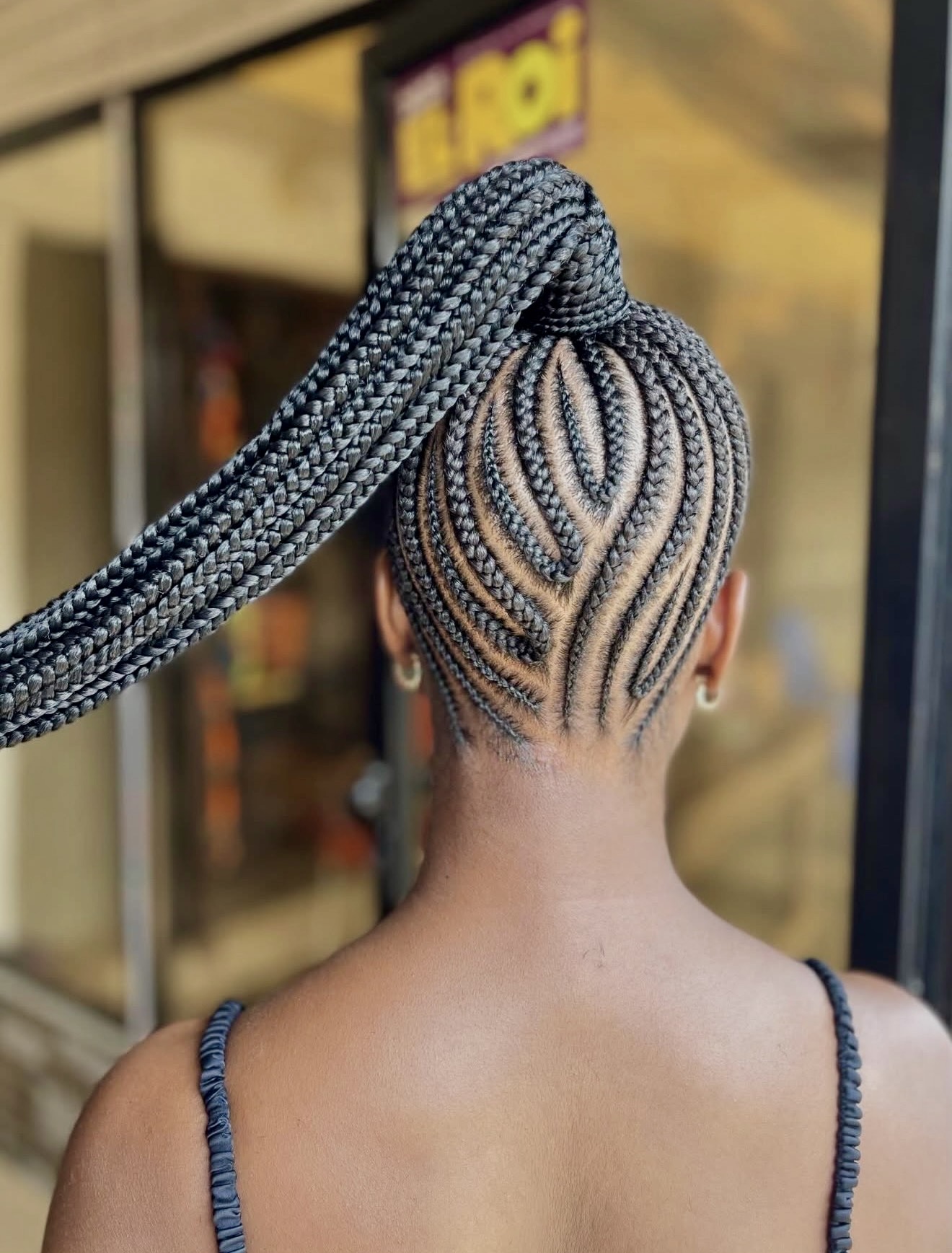Intricate Cornrow Braids With Statement Ponytail