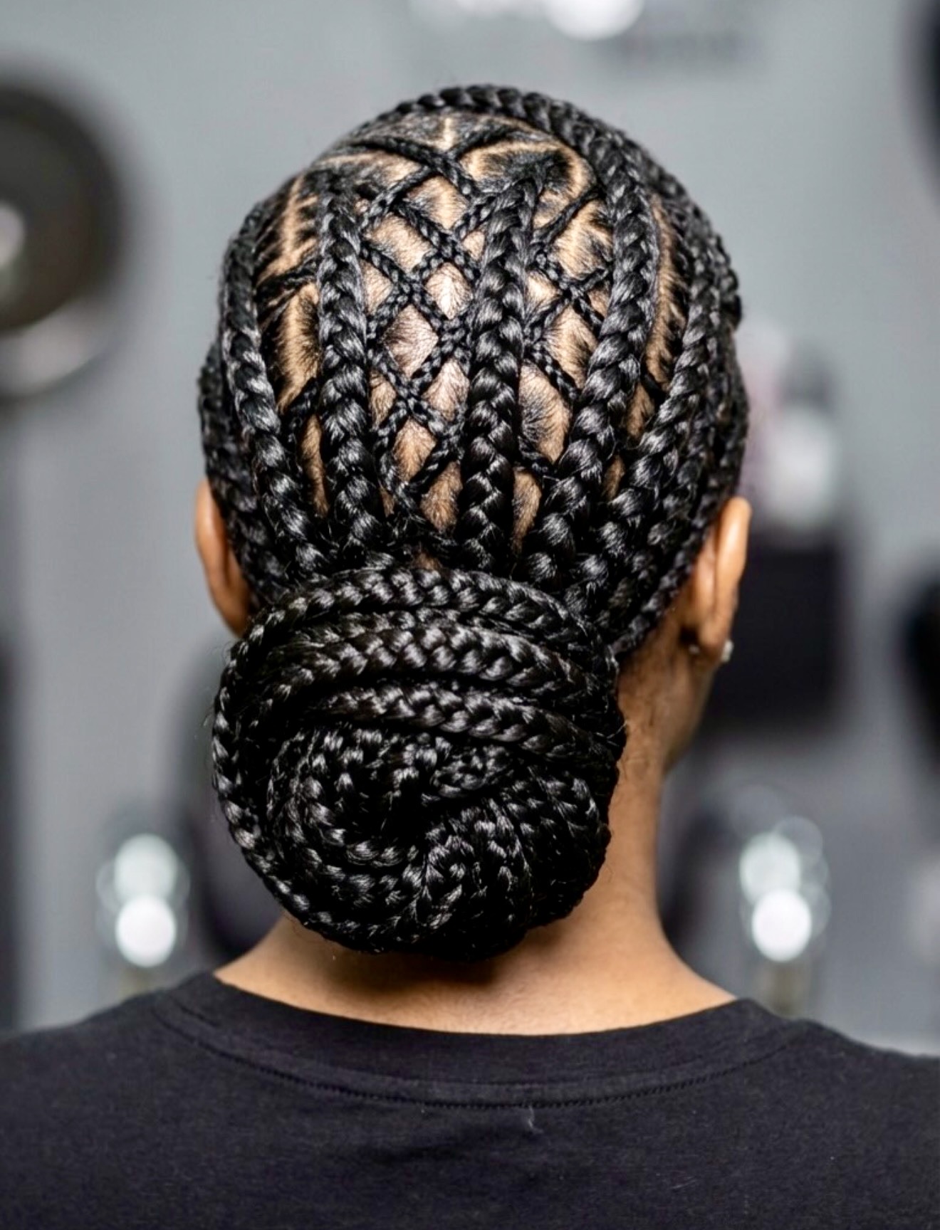 Intricate Geometric Cornrow Updo With Low Bun