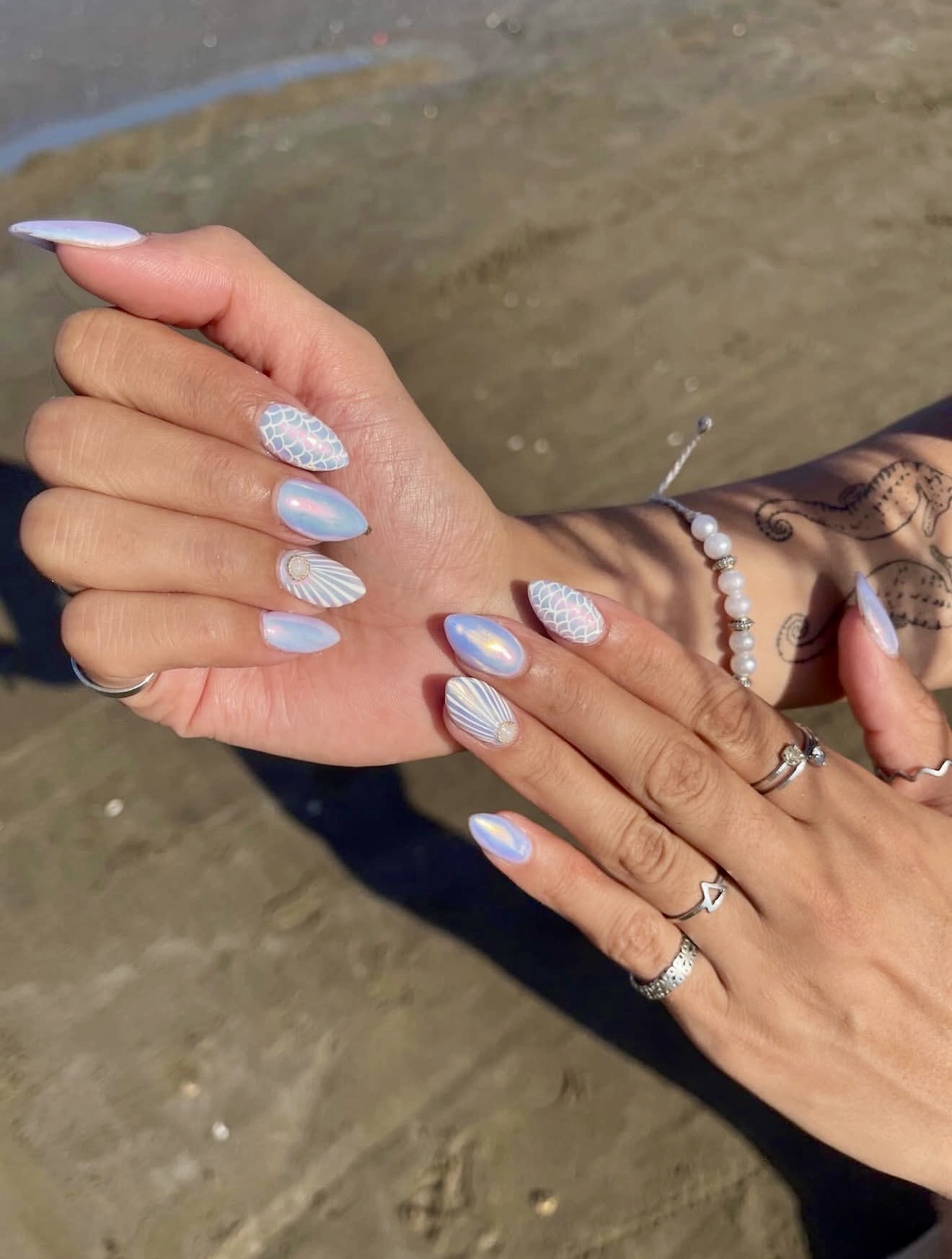 Iridescent Seashell Almond Nails
