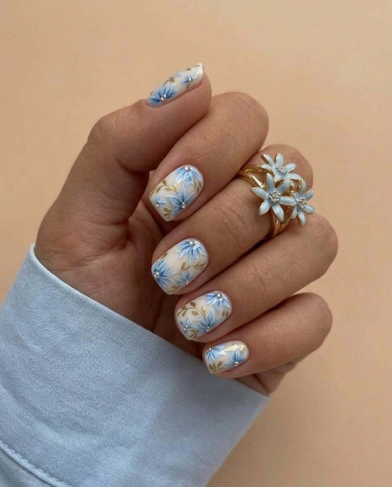 Light Blue Floral Garden Almond Nails