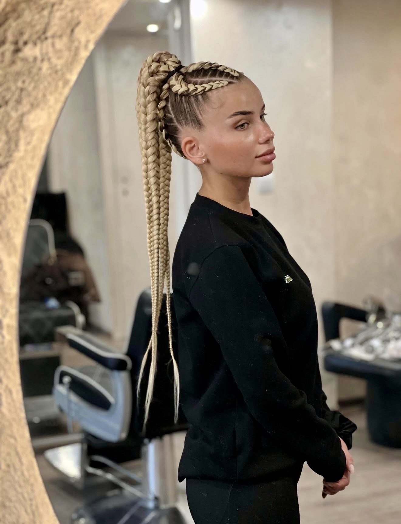 Long Blonde Braids With Undercut and High Ponytail