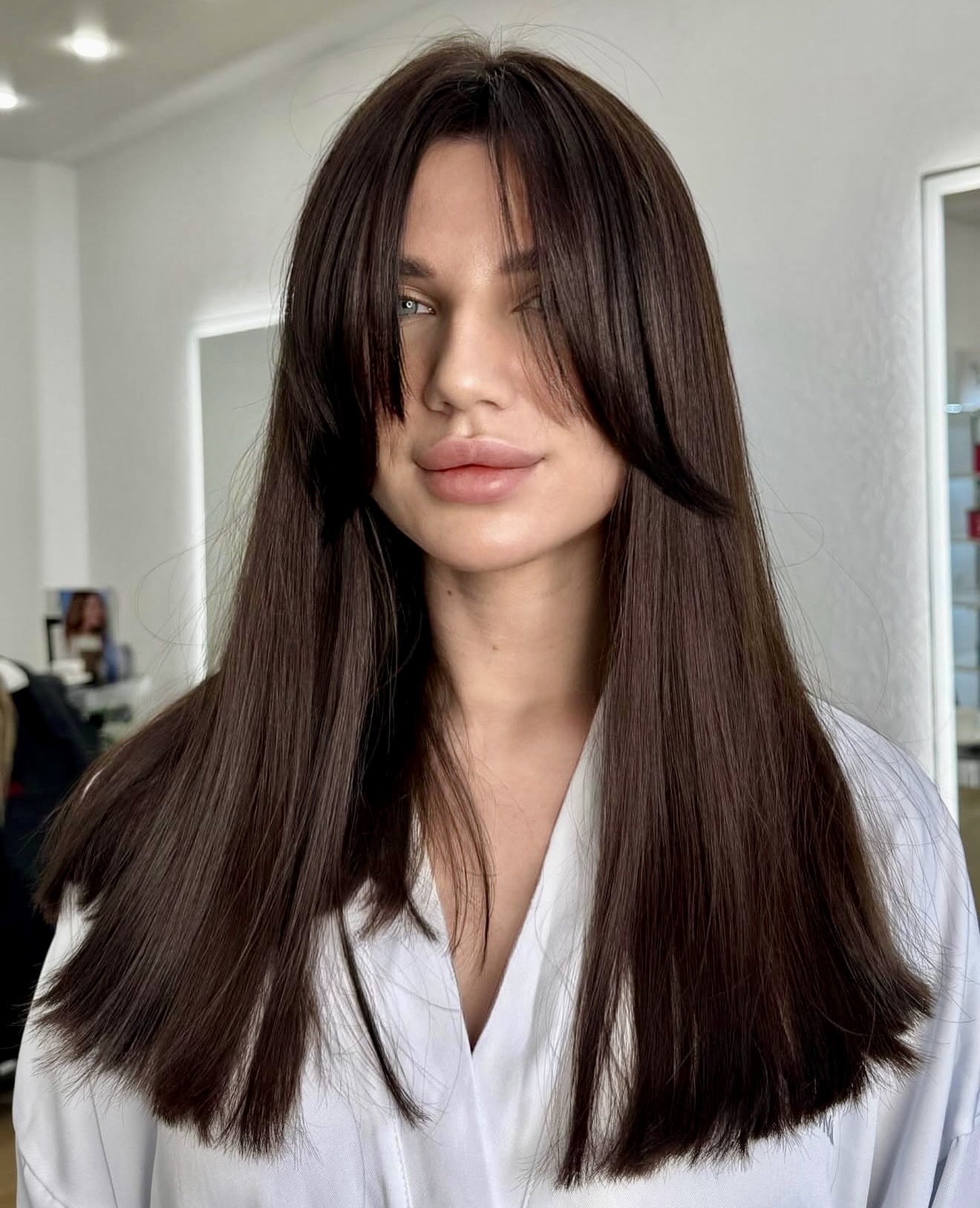 Long Layers With Wispy Curtain Bangs